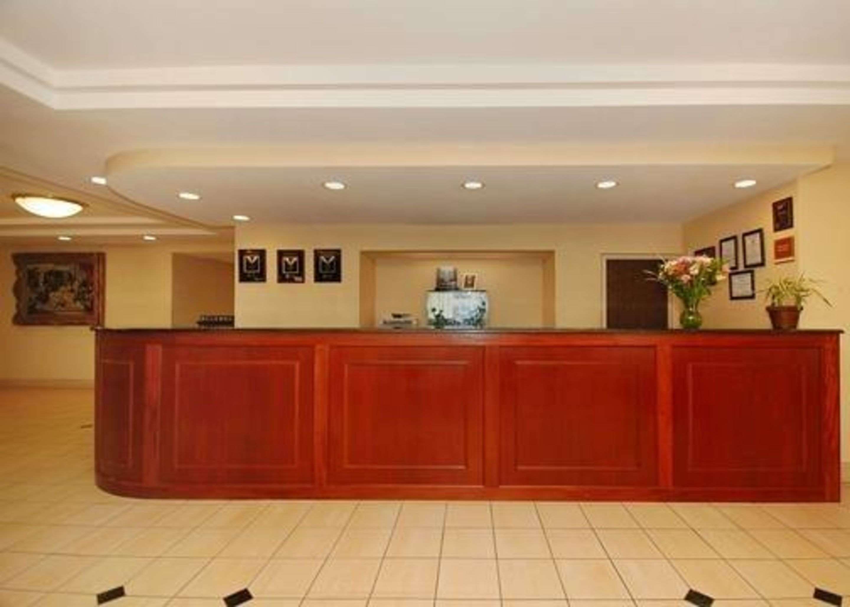 Spacious lobby with sitting area | Quality Inn & Suites