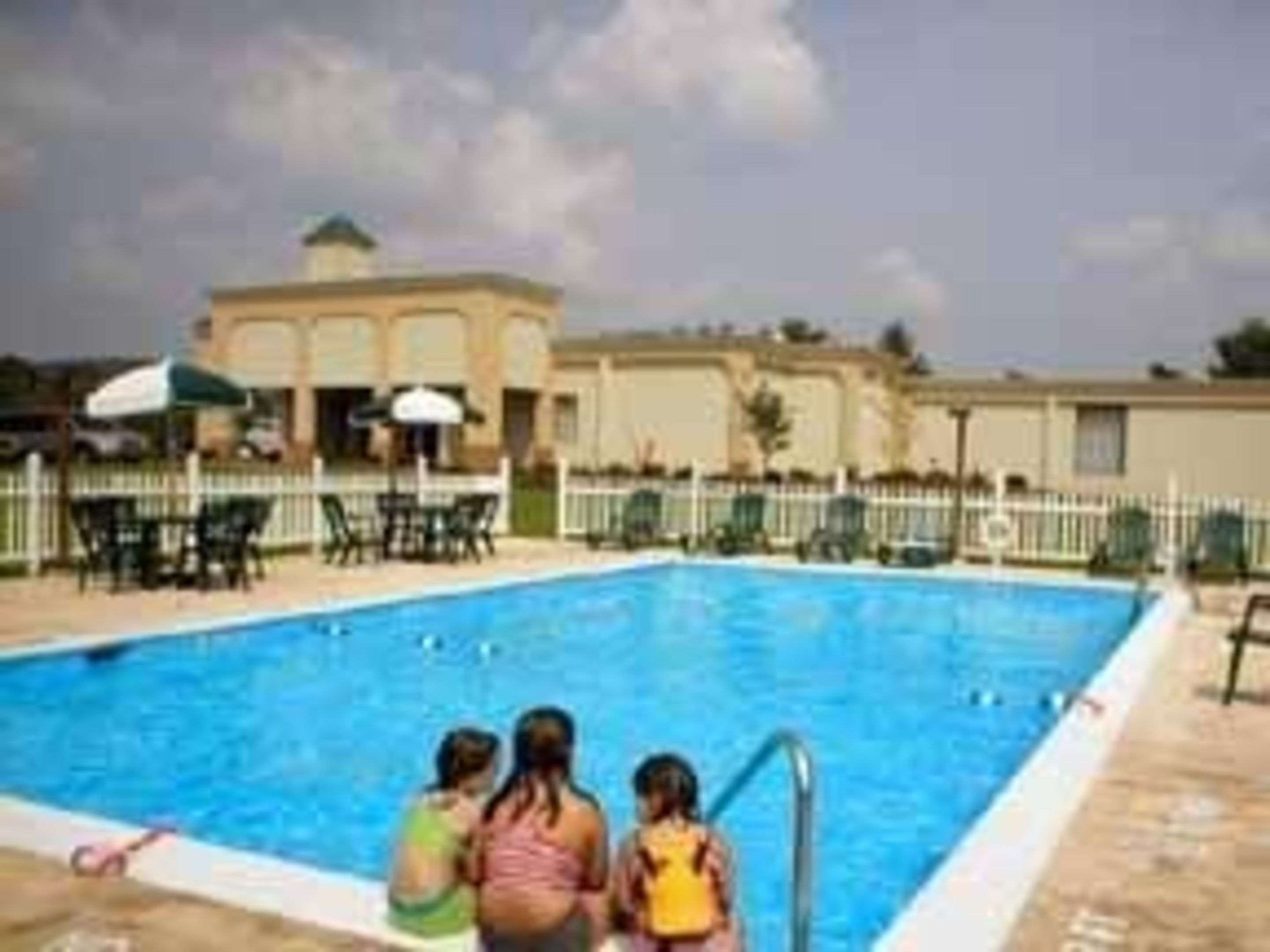 Outdoor pool | Quality Inn & Suites