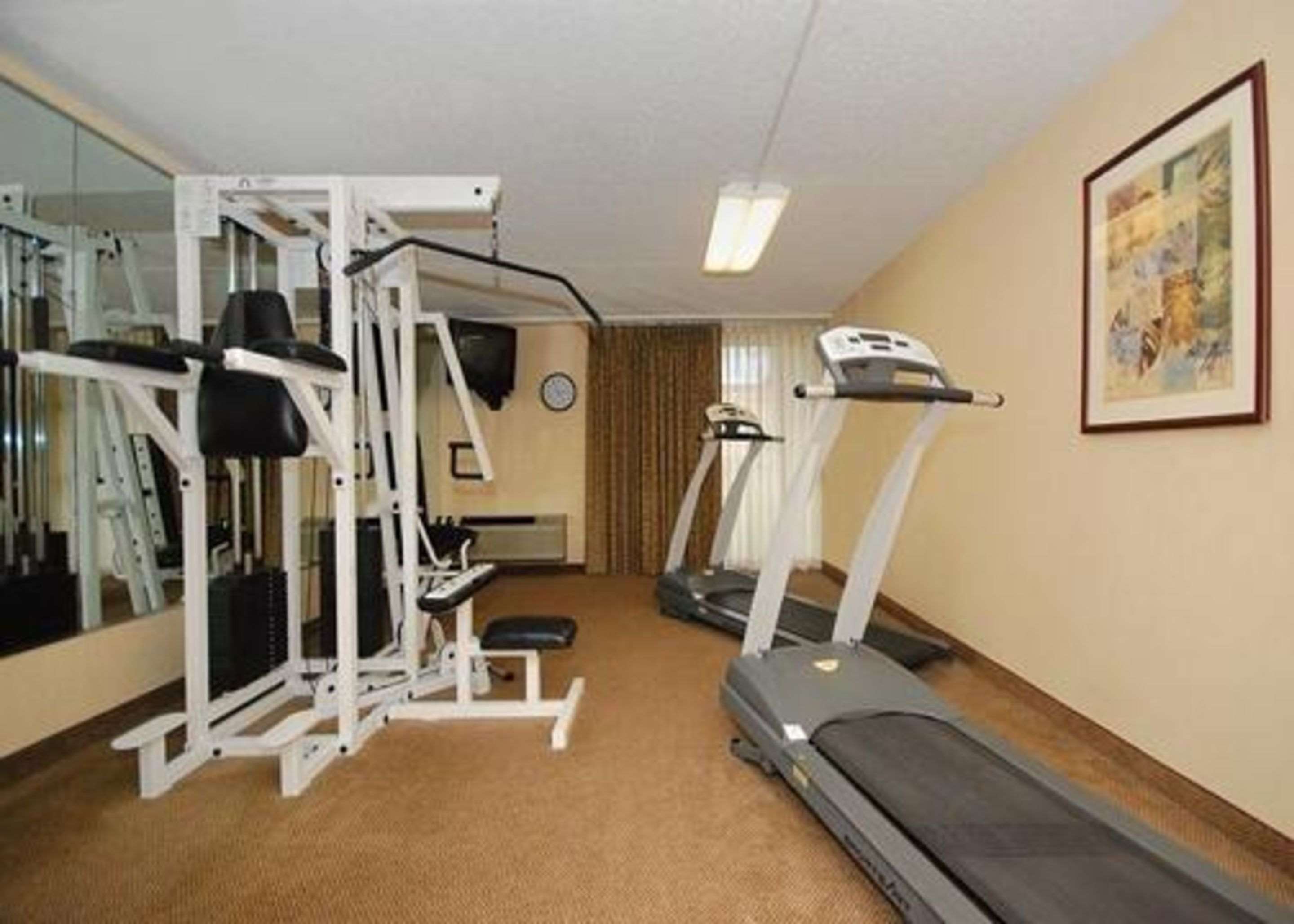 Fitness center with cardio equipment | Quality Inn & Suites
