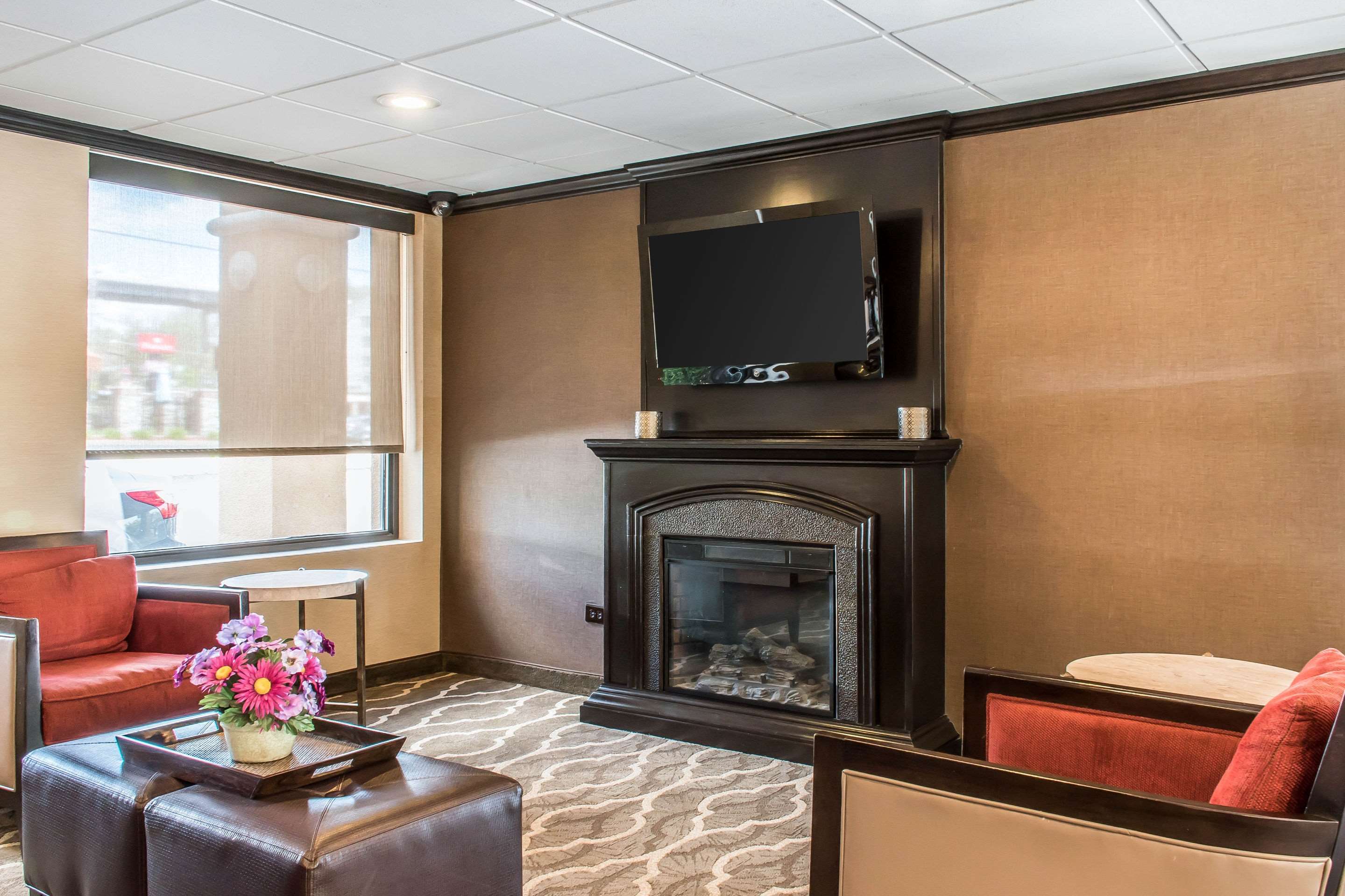 Relax by the lobby fireplace | Comfort Inn