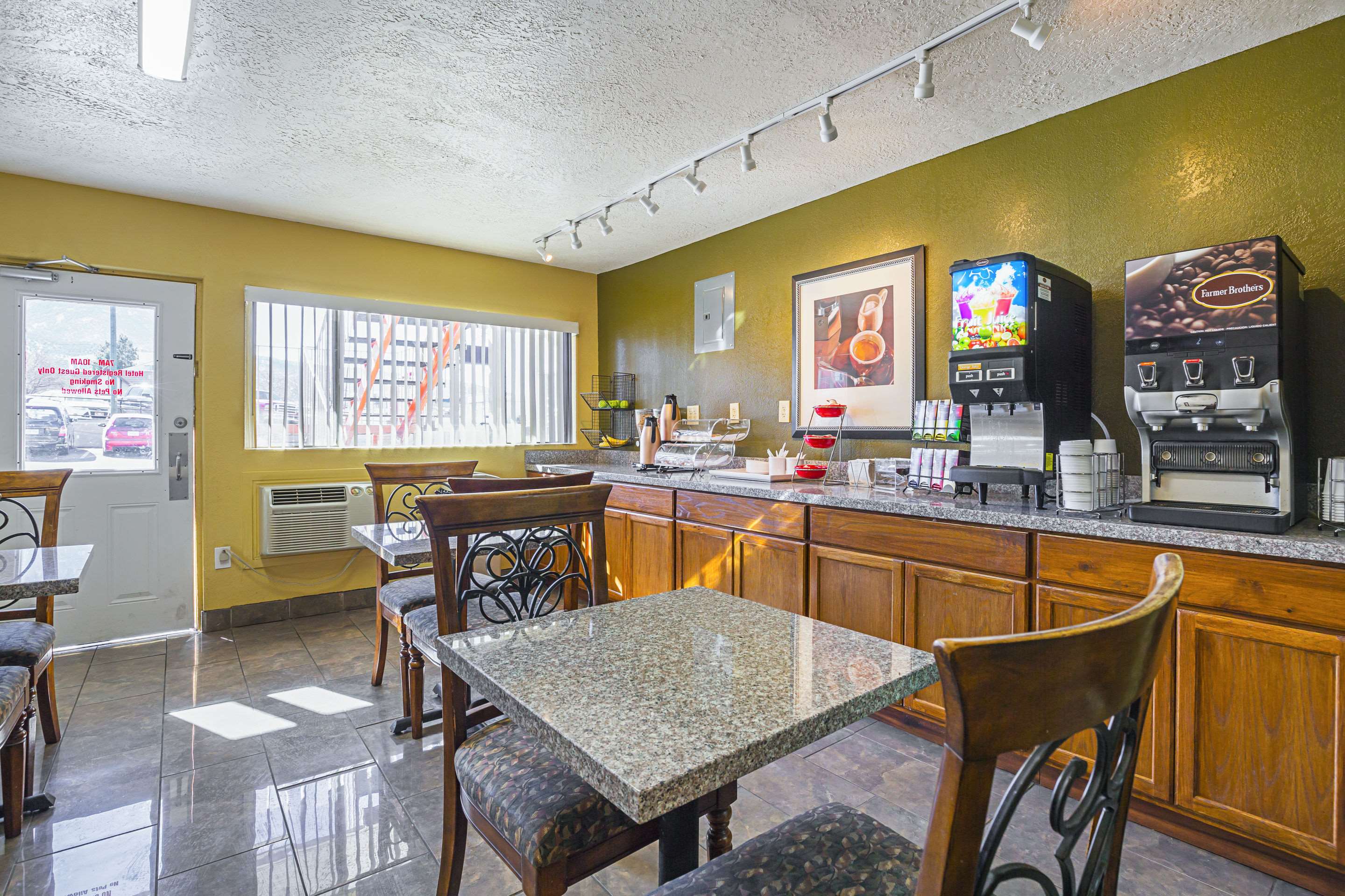 Enjoy breakfast in this seating area | Rodeway Inn Cedar City