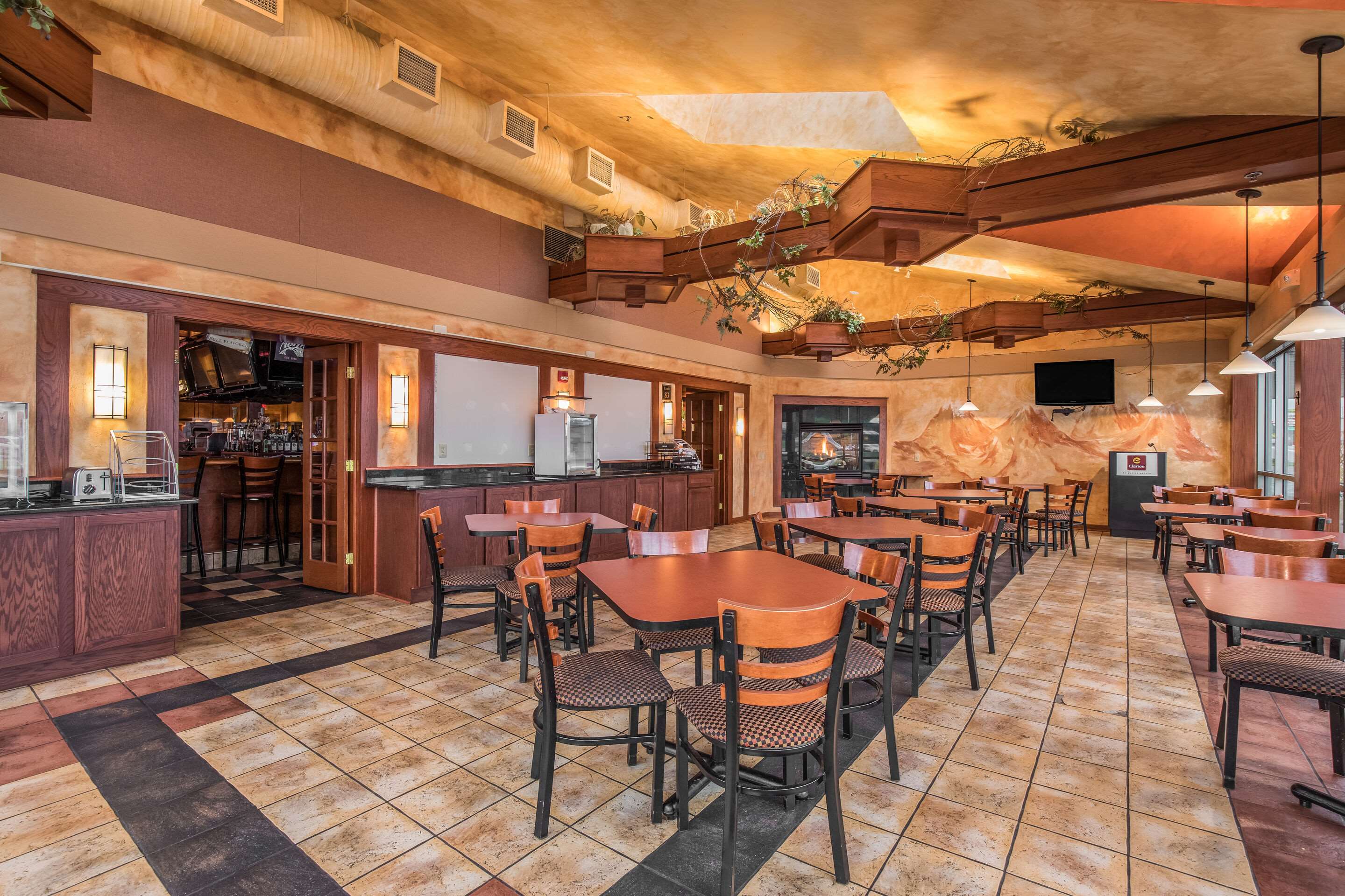 Enjoy breakfast in this seating area | Clarion Hotel and Convention Center