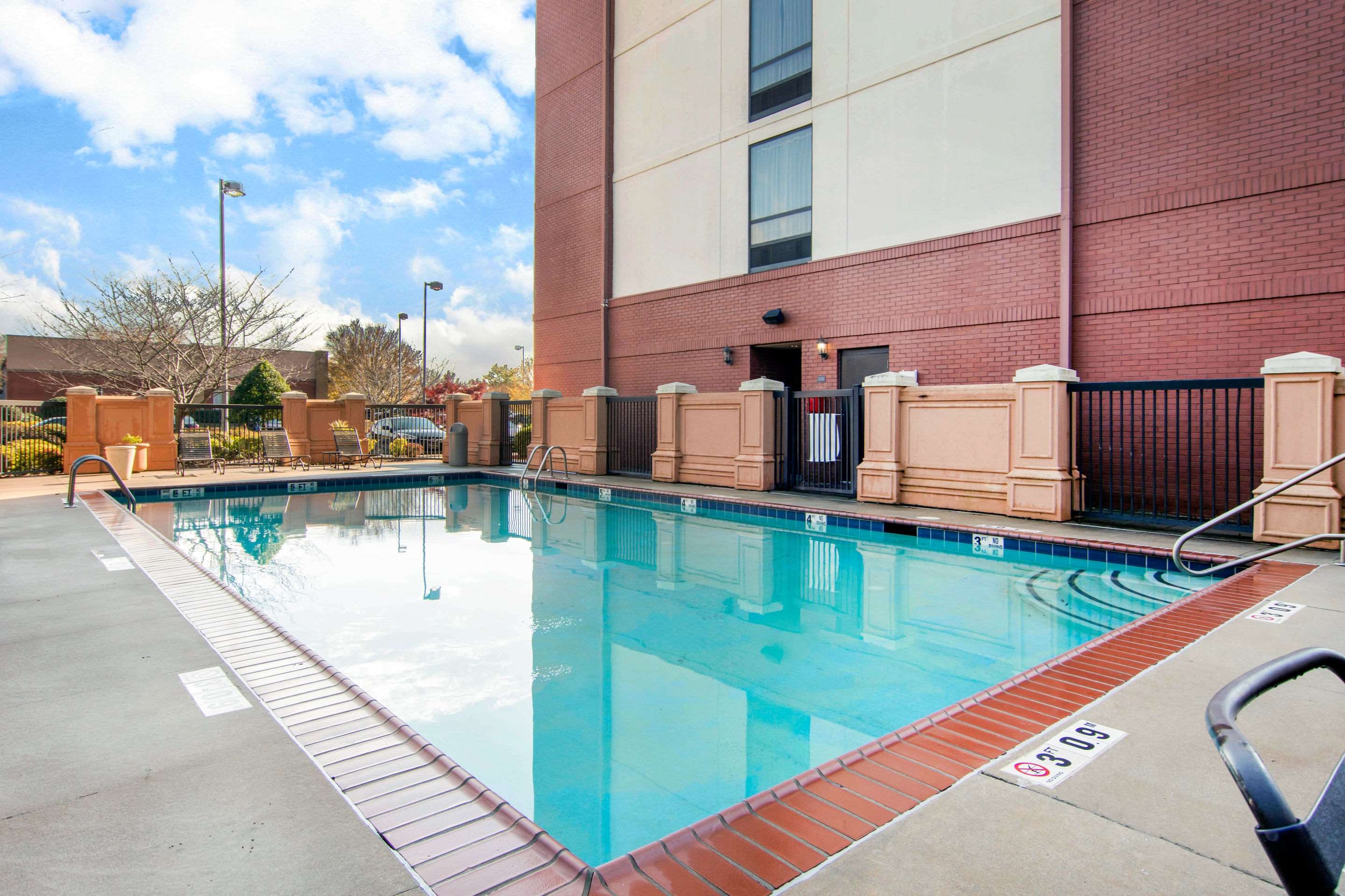 Outdoor pool | AmericInn by Wyndham Stonecrest near Atlanta