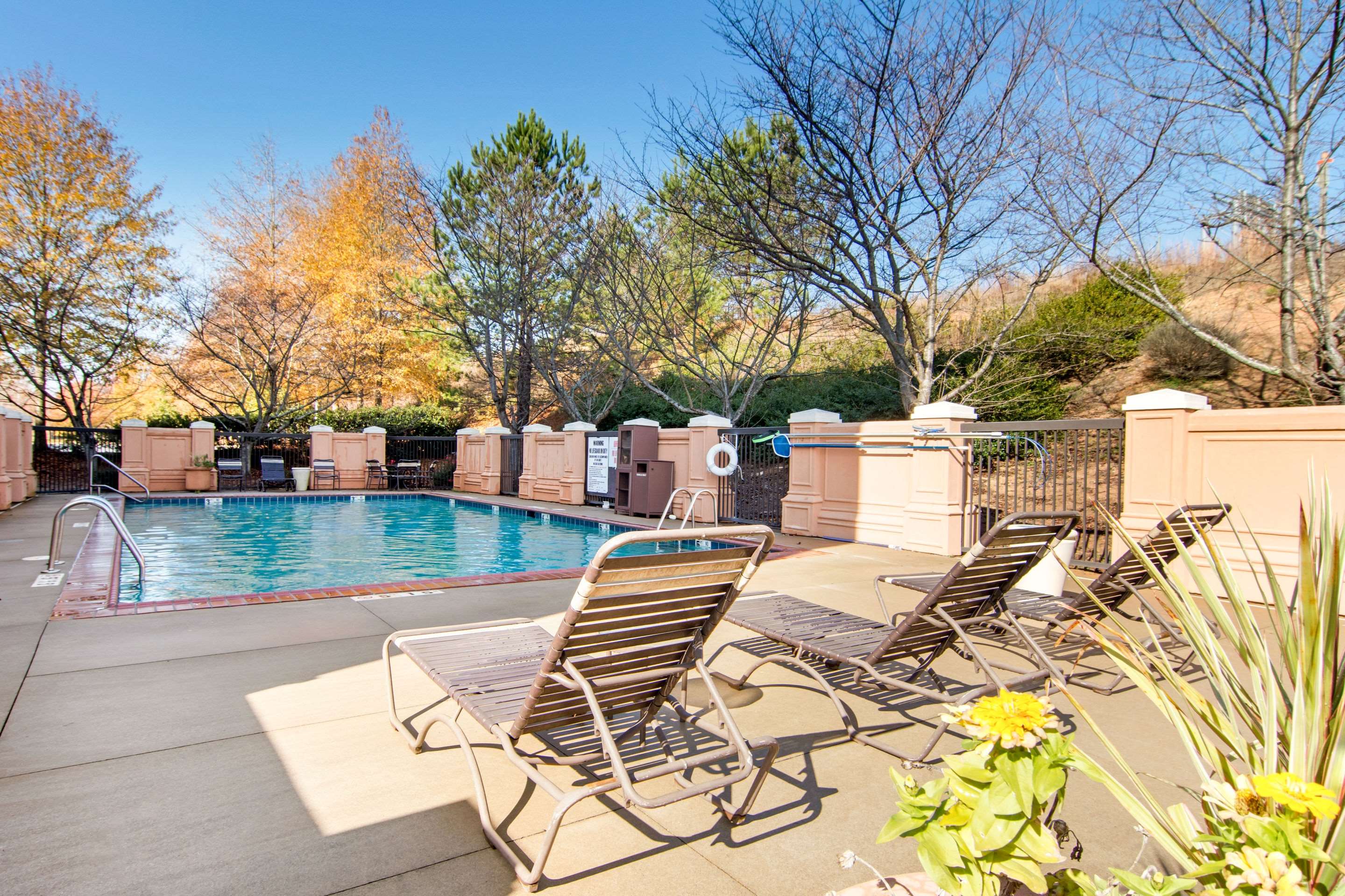 Relax by the pool | AmericInn by Wyndham Stonecrest near Atlanta