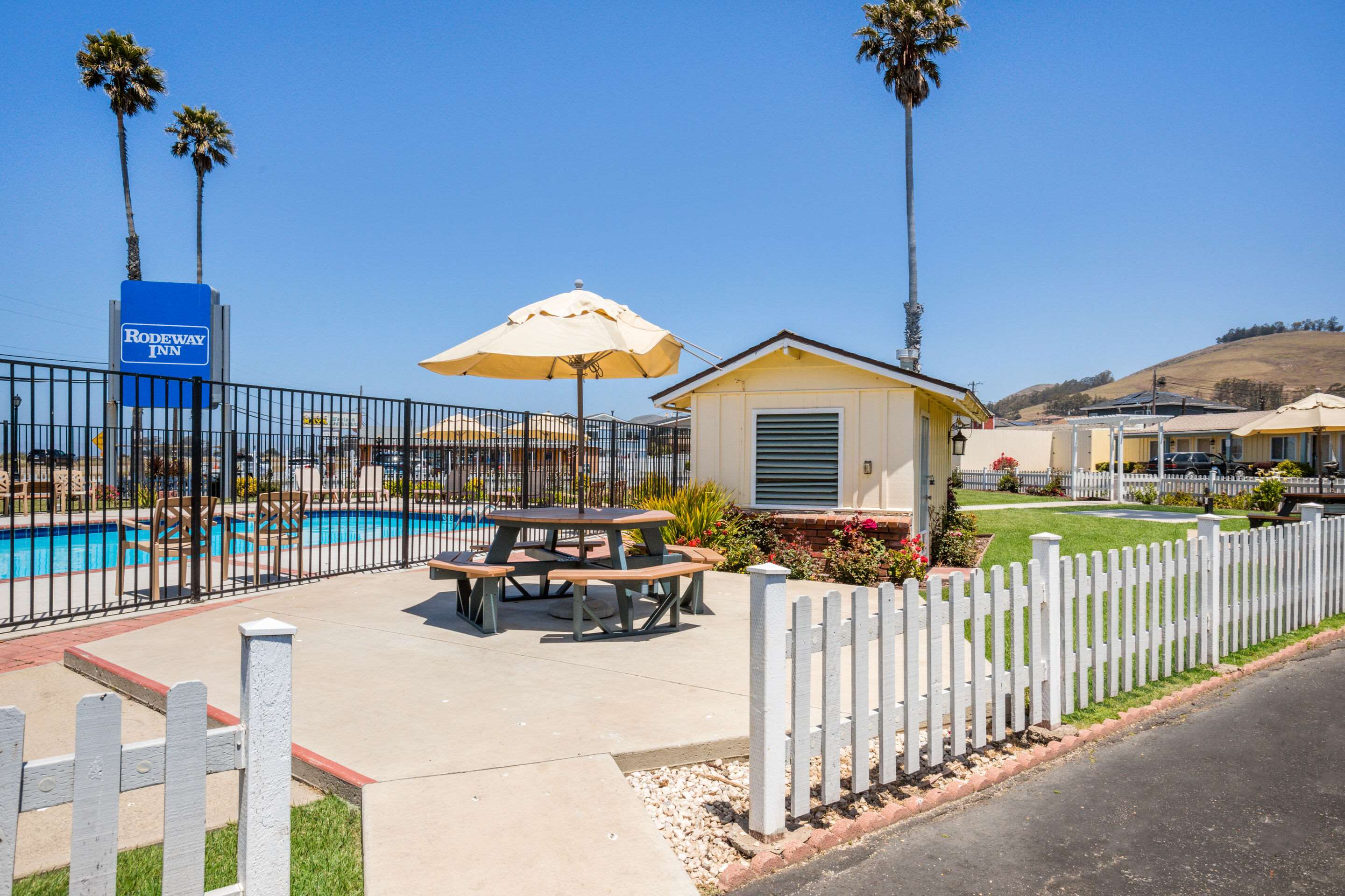 Relax by the pool | Rodeway Inn at Morro Bay