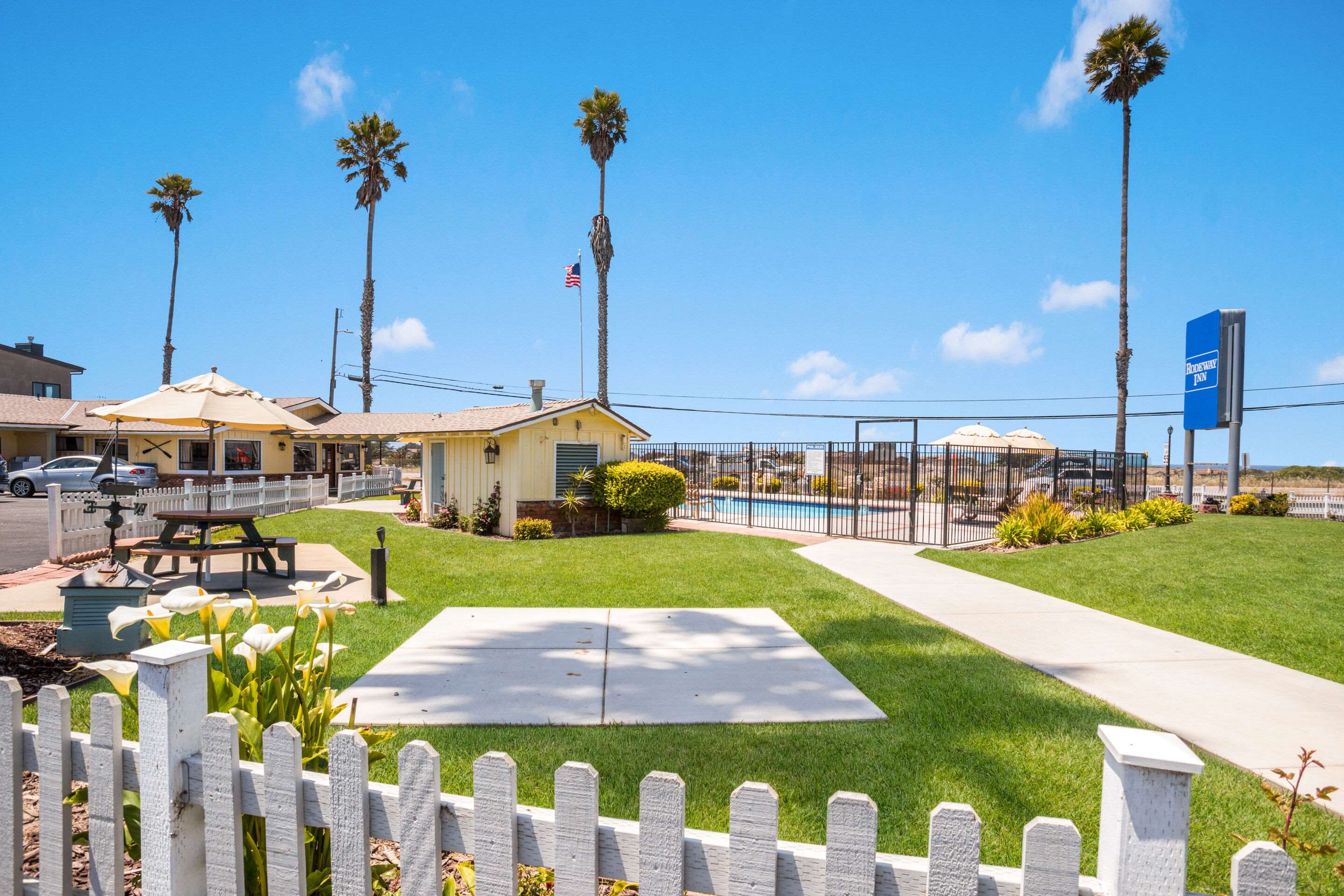 Relax by the pool | Rodeway Inn at Morro Bay