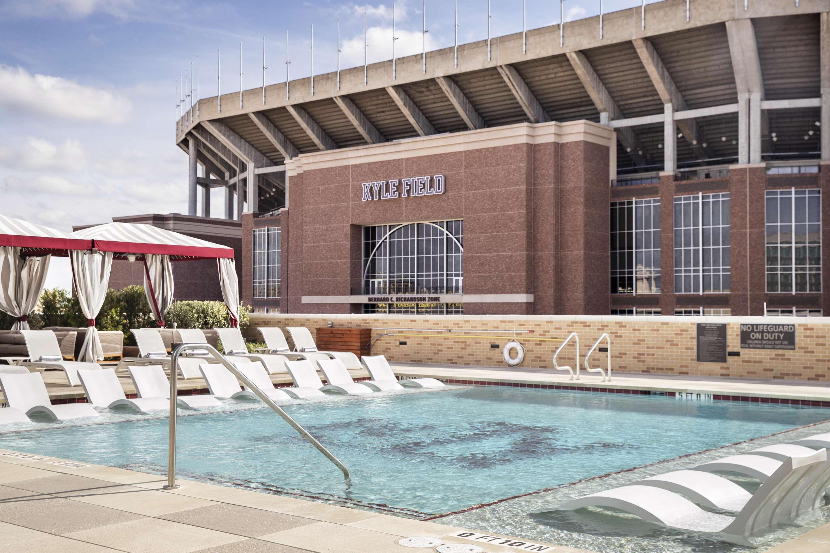 pool view with Kyle Field | Texas A&M Hotel and Conference Center