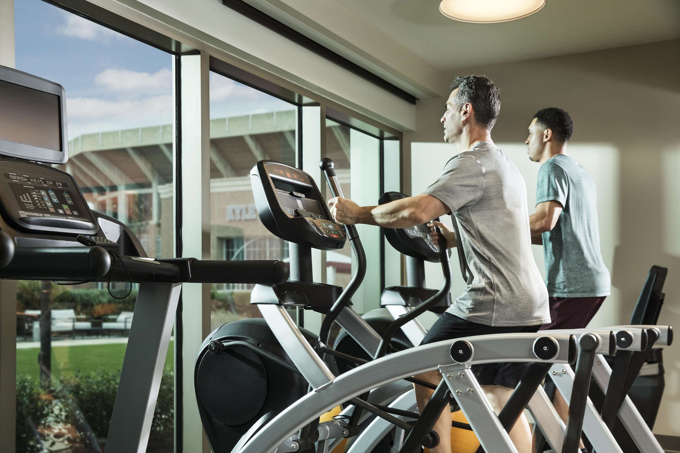 fitness center on equipment | Texas A&M Hotel and Conference Center