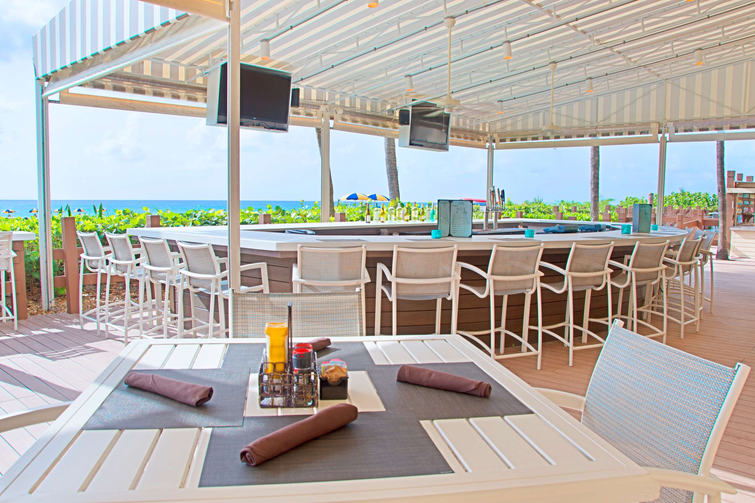 Restaurant | The Singer Oceanfront Resort, Curio Collection by Hilton