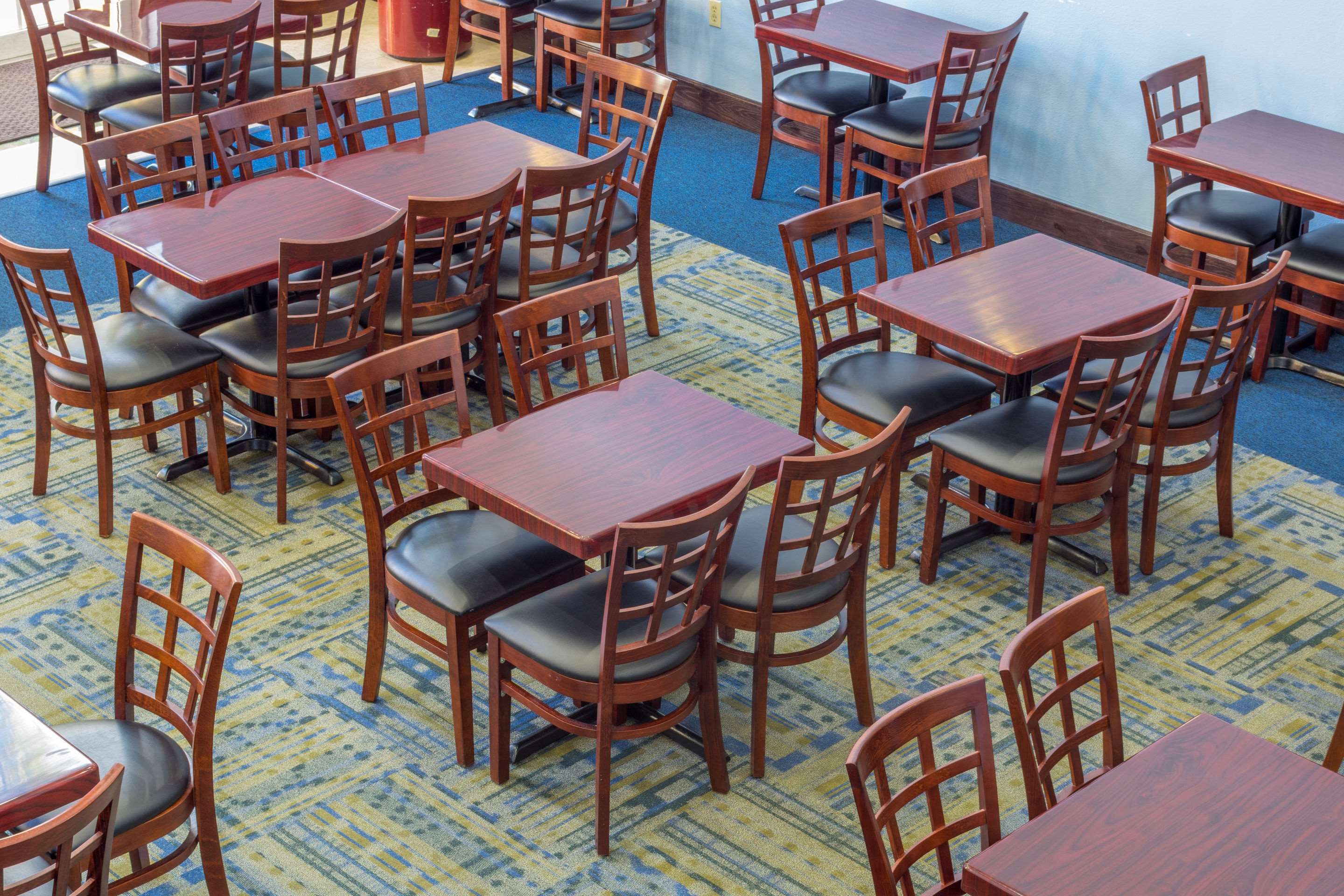Enjoy breakfast in this seating area | Quality Suites Lake Buena Vista
