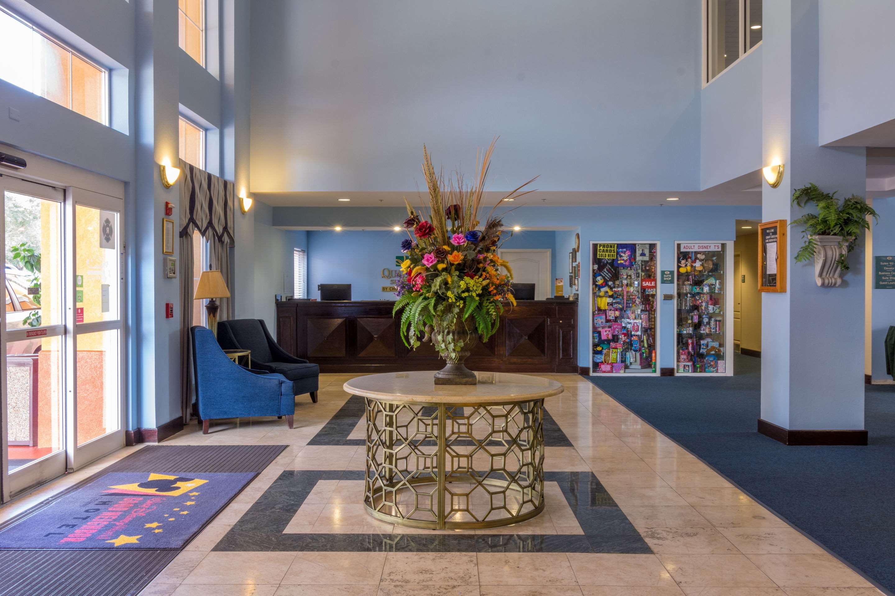 Spacious lobby with sitting area | Quality Suites Lake Buena Vista