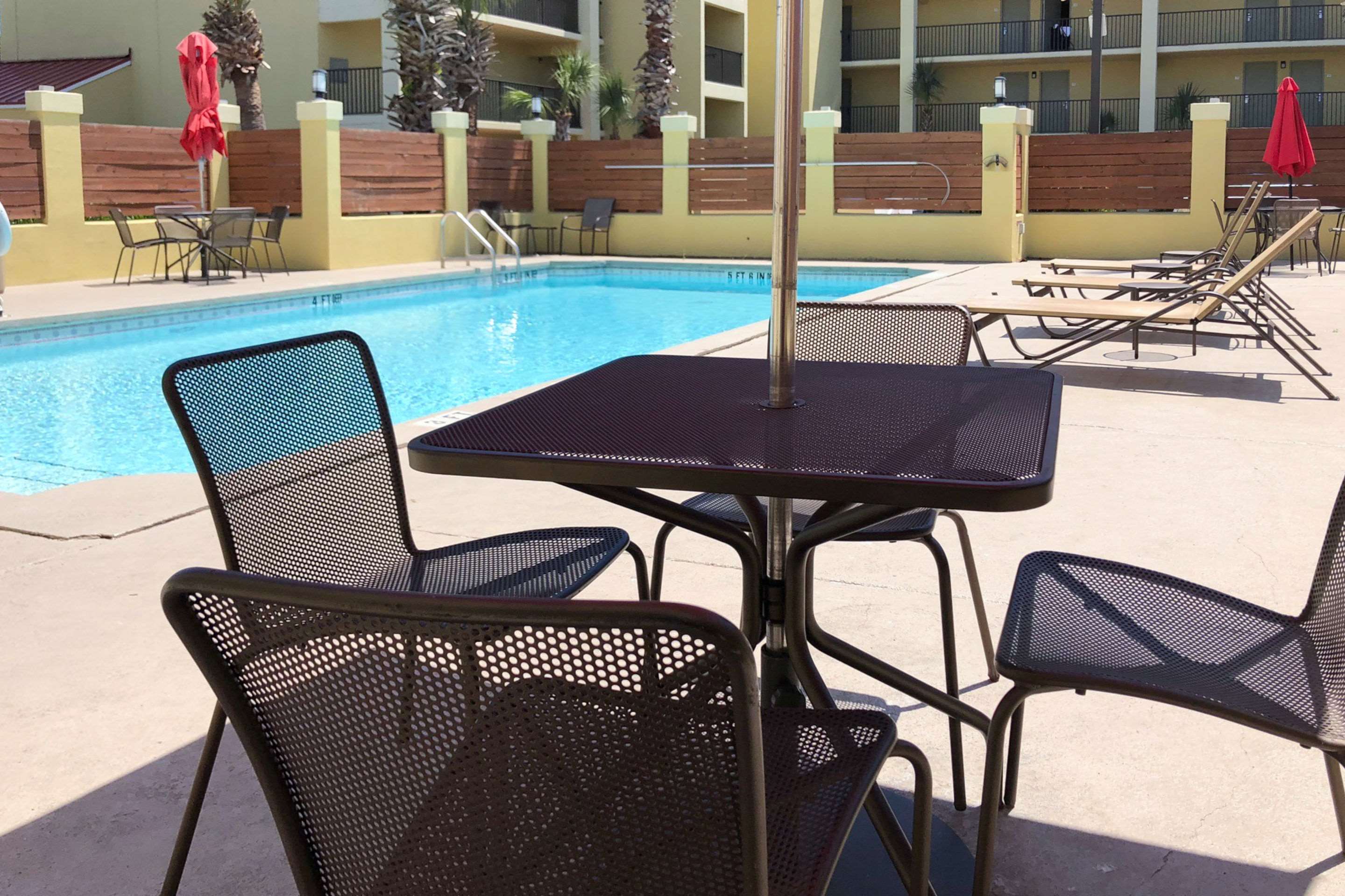 Relax by the pool | Quality Inn & Suites Miramar Beach
