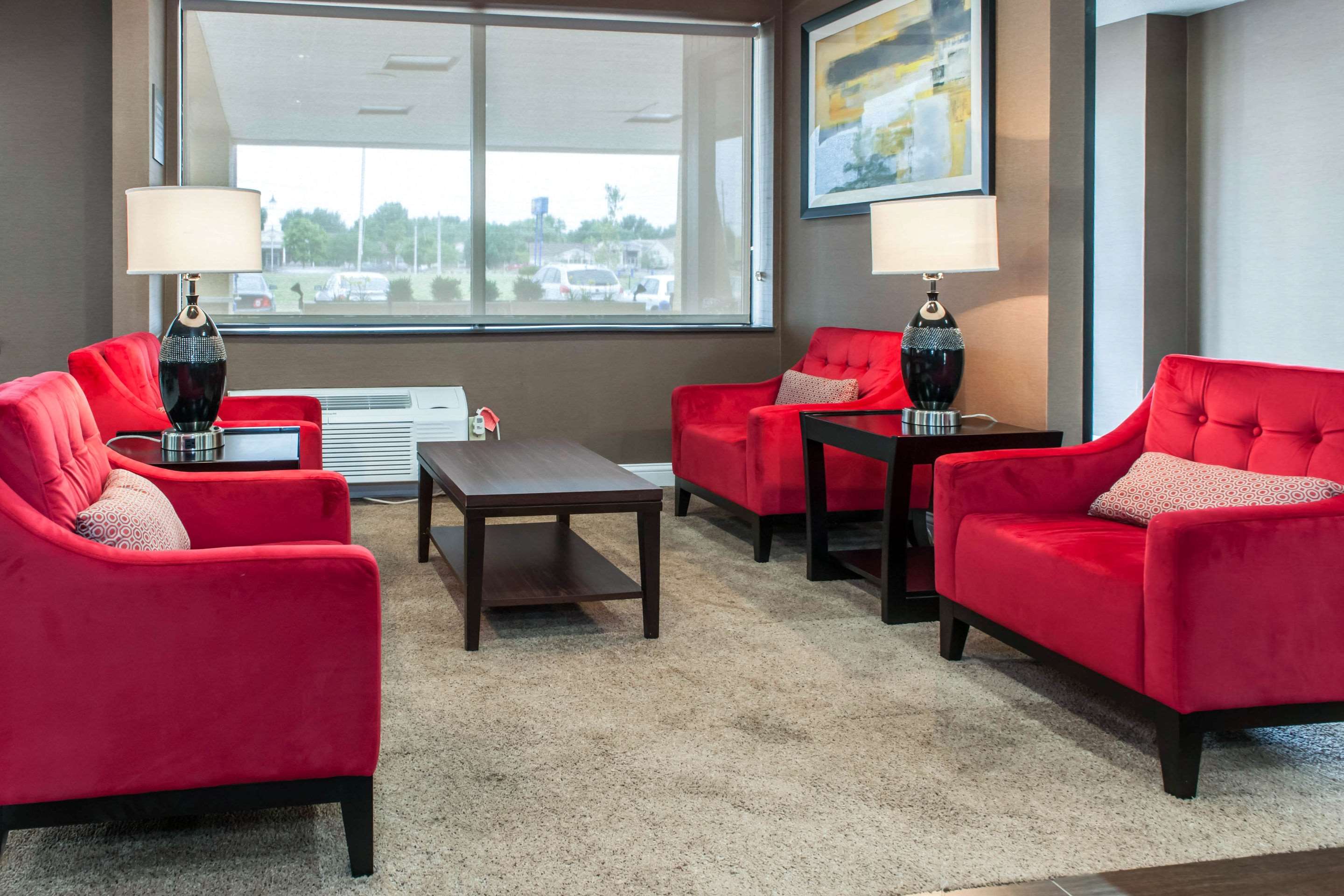 Lobby with sitting area | Comfort Inn near I-69 and Washington Center Road