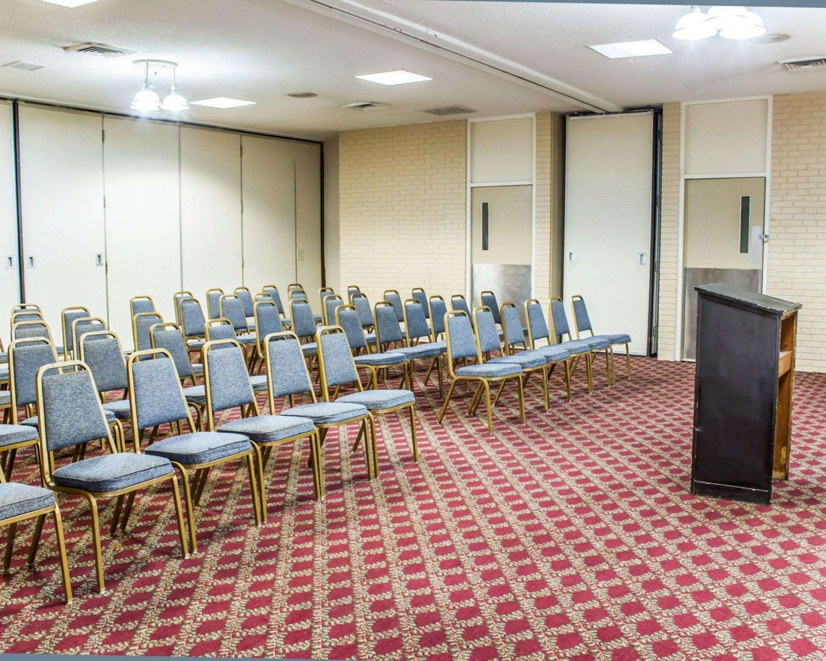 Meeting room with theater-style setup | Econo Lodge & Suites