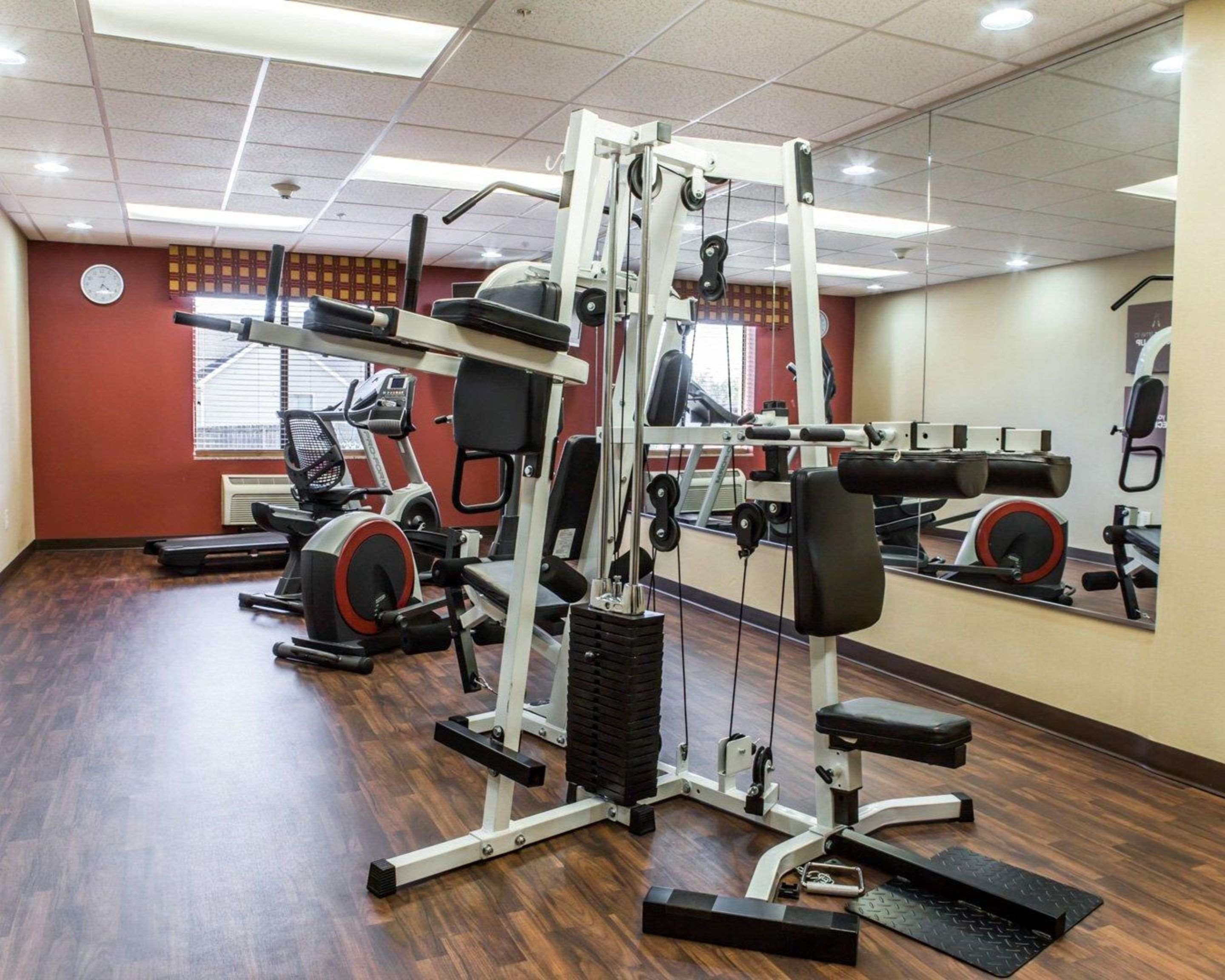 Fitness center with cardio equipment and weights | Fairfield Inn & Suites by Marriott Greensboro Coliseum Area
