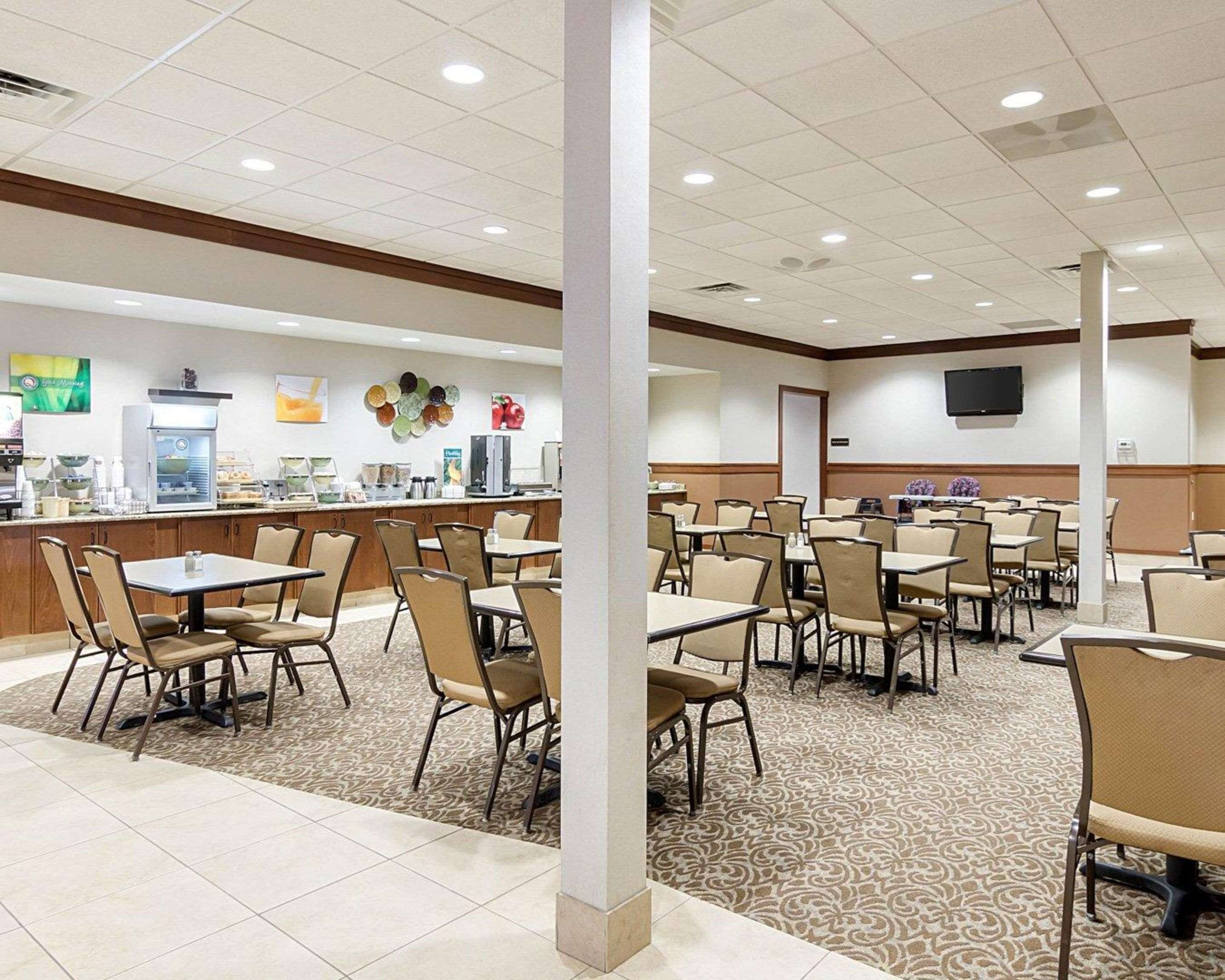 Enjoy breakfast in this seating area | Quality Inn & Suites Conference Center and Water Park
