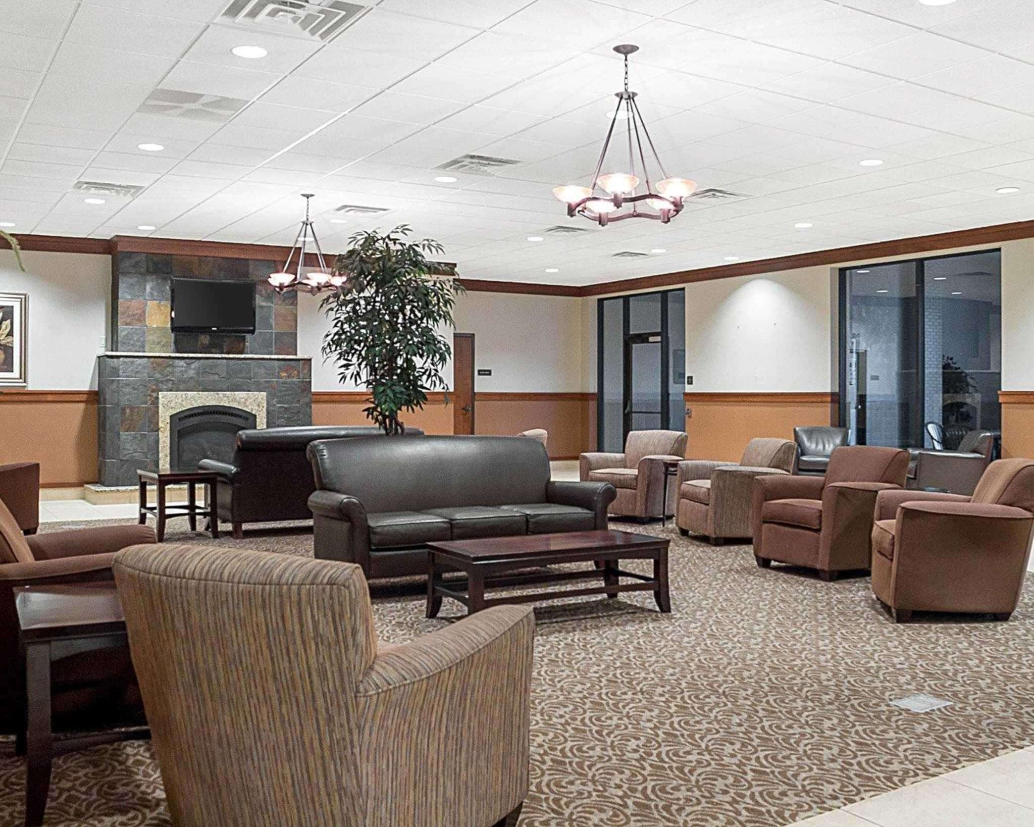 Lobby with fireplace | Quality Inn & Suites Conference Center and Water Park
