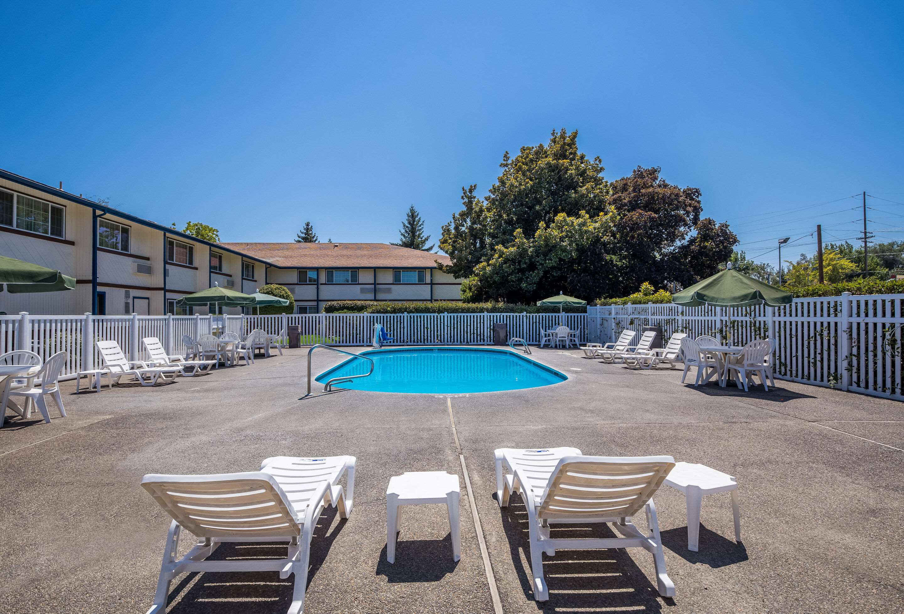 Outdoor pool | Quality Inn & Suites Medford Airport