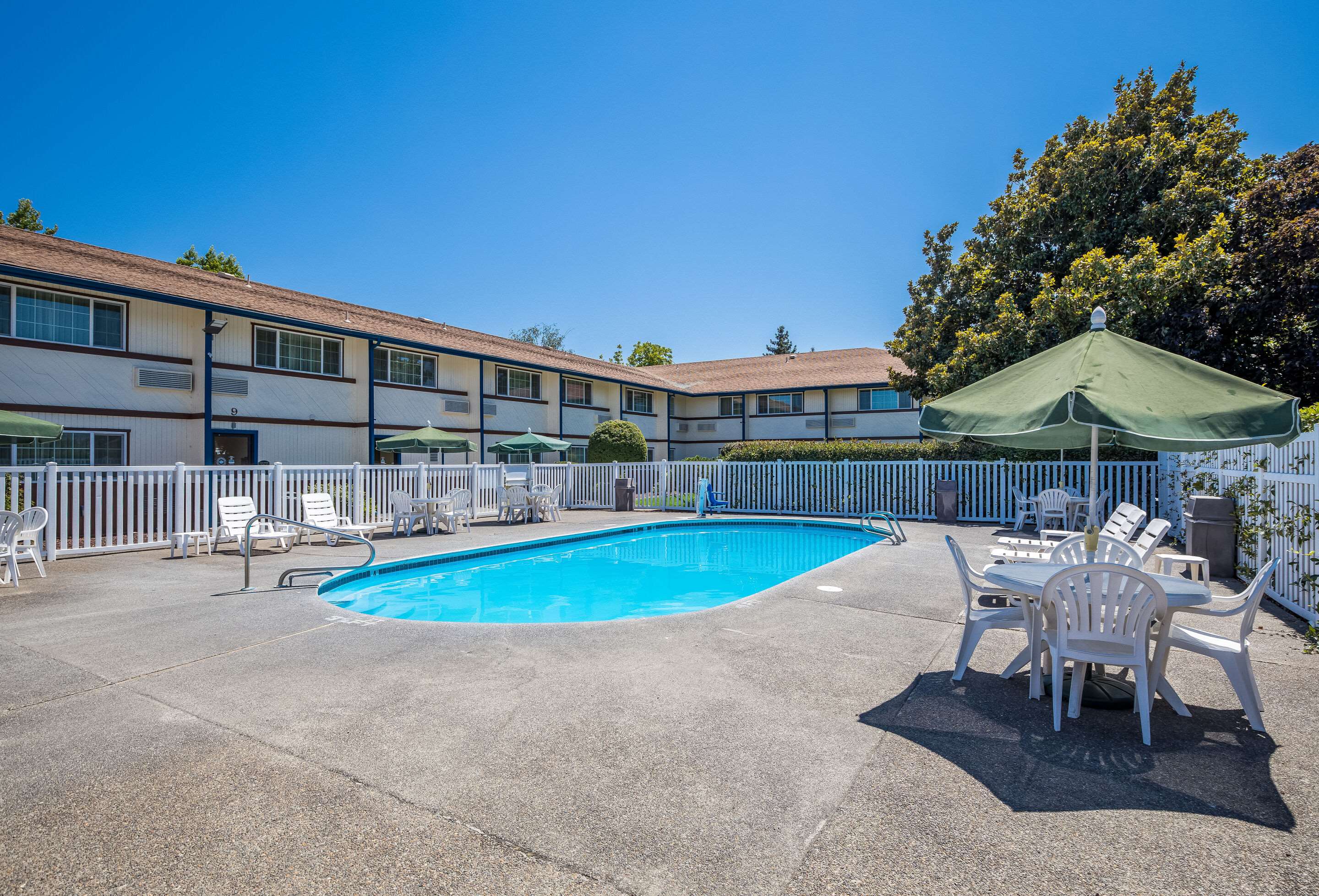Relax by the pool | Quality Inn & Suites Medford Airport