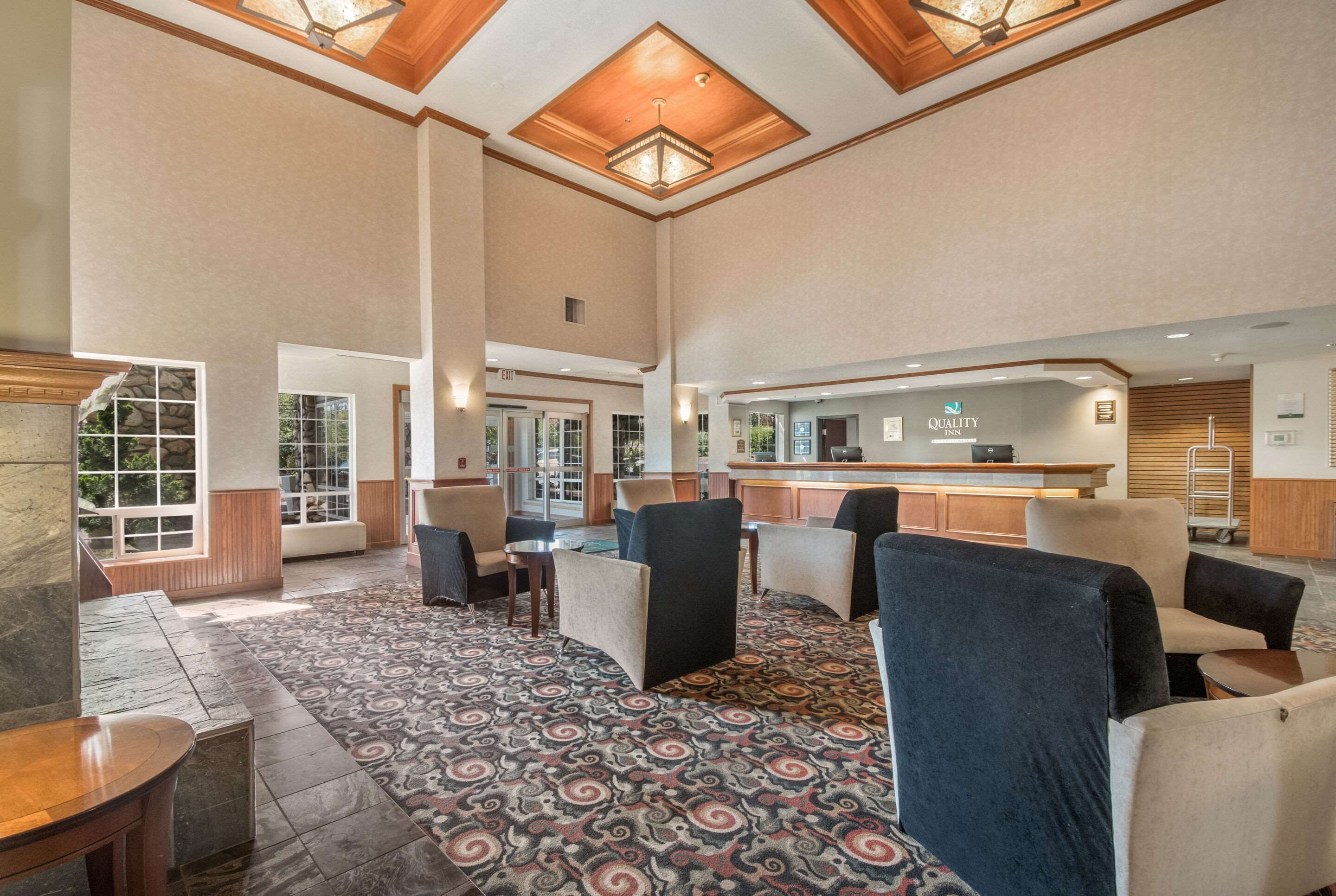 Spacious lobby with sitting area | Quality Inn