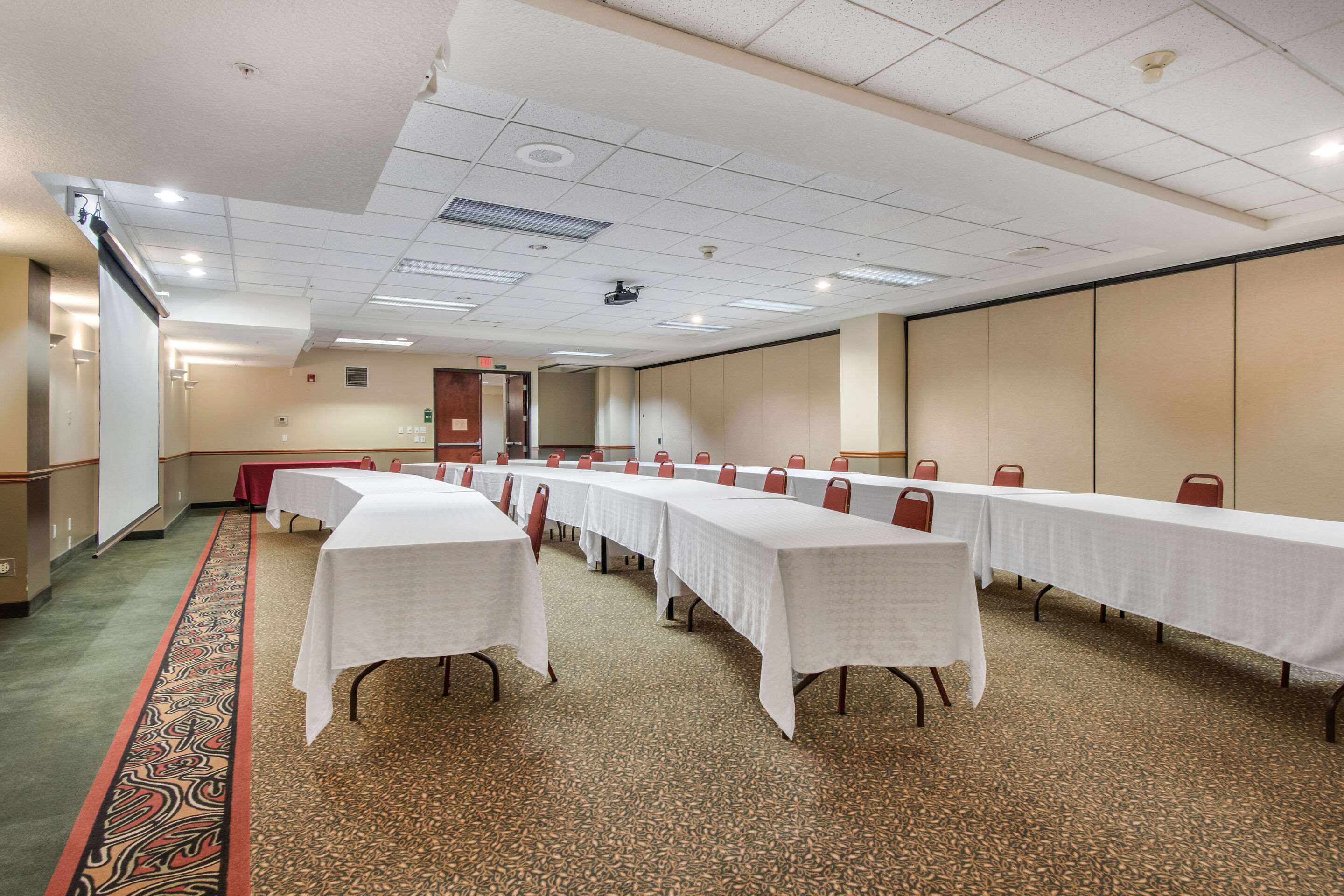 Banquet meeting room with audiovisual equipment | Quality Inn