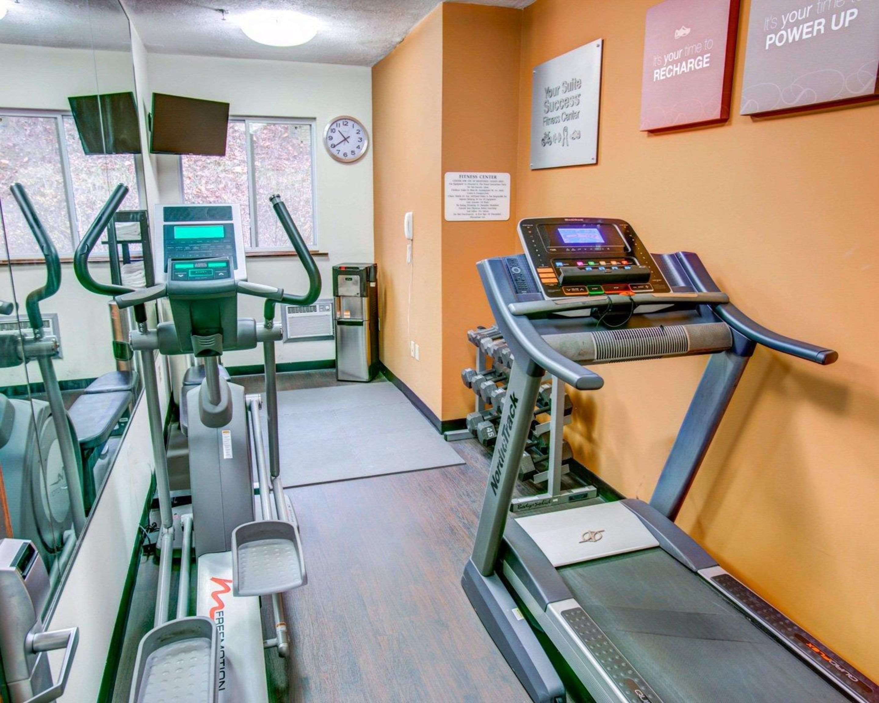 Exercise room with cardio equipment and weights | Comfort Suites Coraopolis