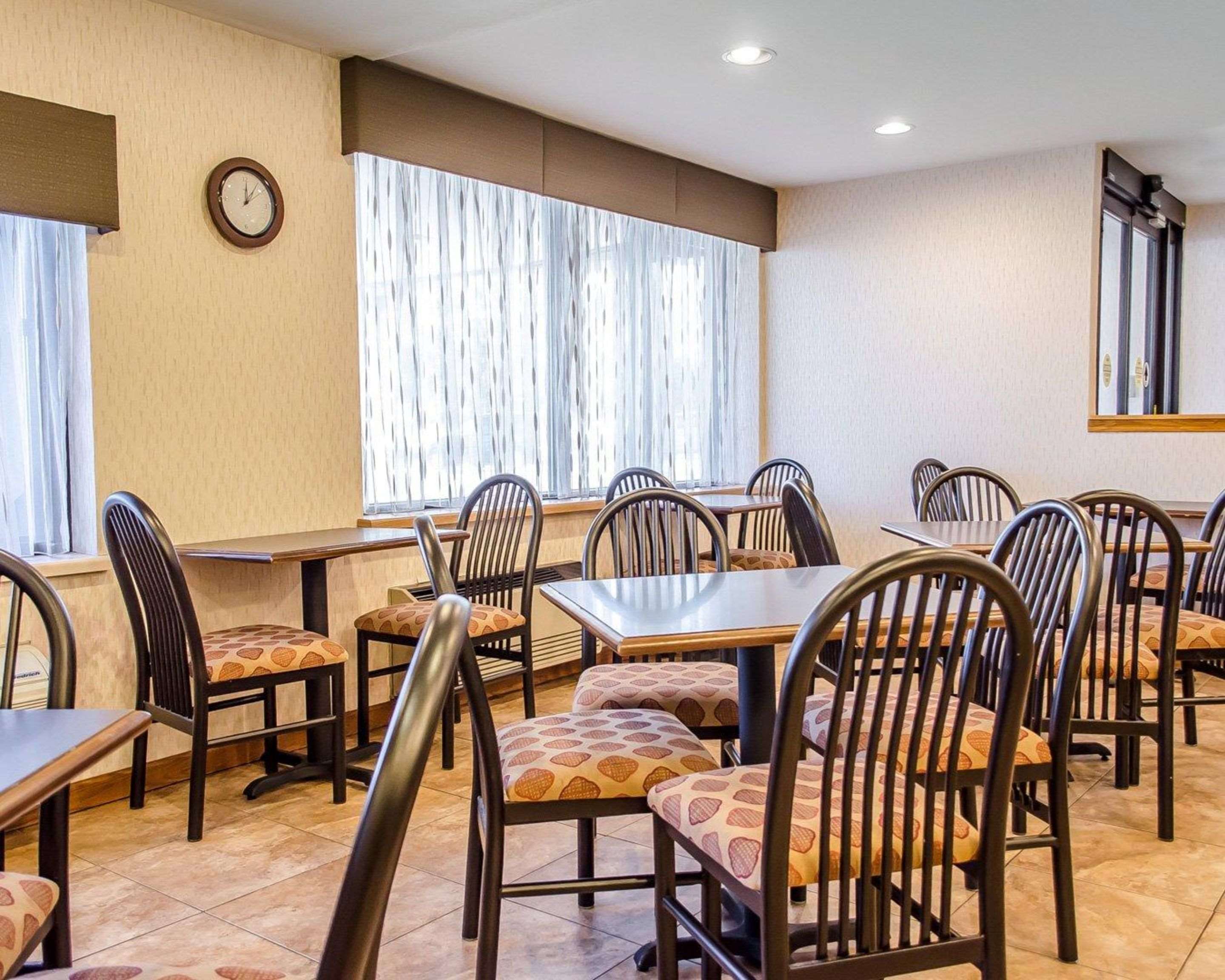 Enjoy breakfast in this seating area | Quality Inn Harrisburg - Hershey Area