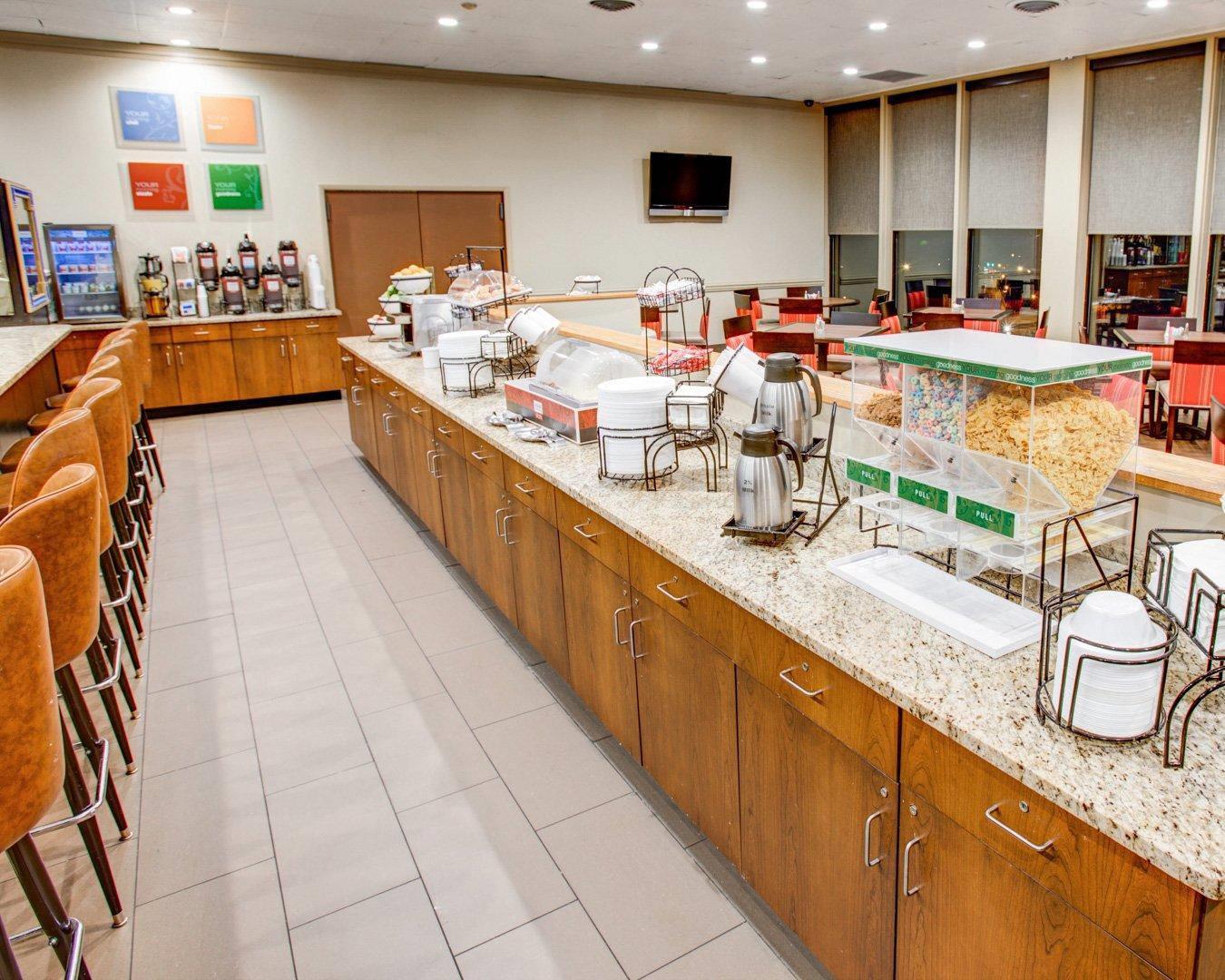 Enjoy breakfast in this spacious area | Comfort Inn Conference Center