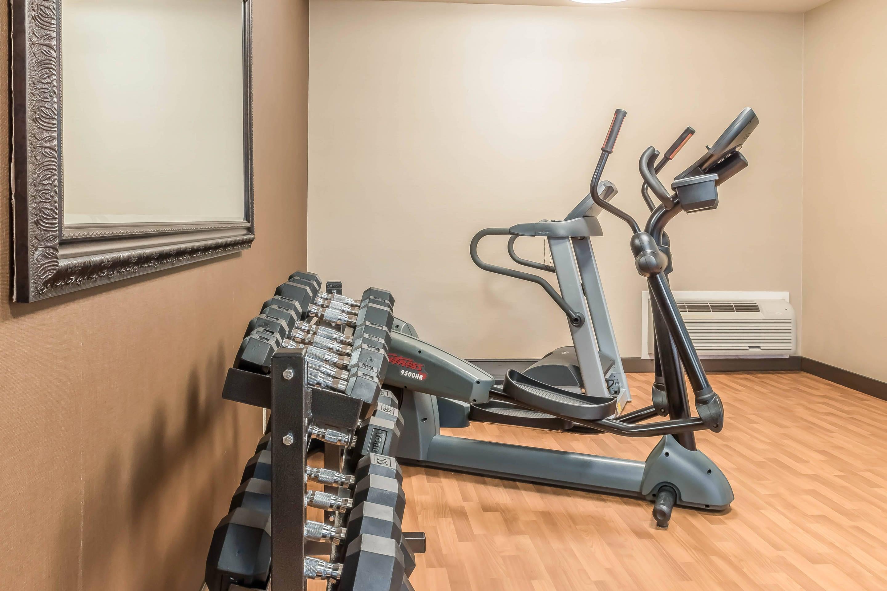 Exercise room with cardio equipment and weights | Comfort Inn Lancaster County