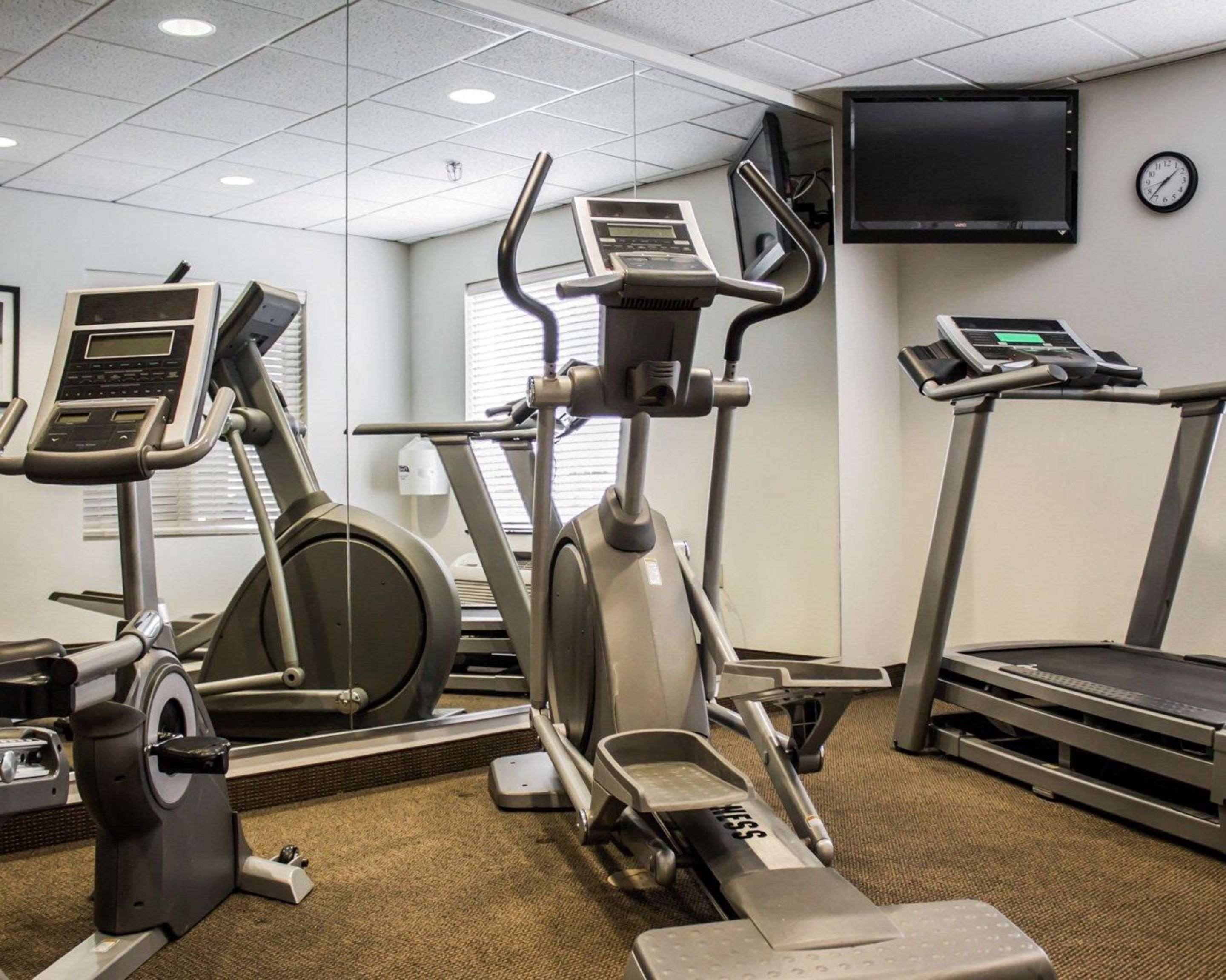 Exercise room with cardio equipment | Sleep Inn & Suites