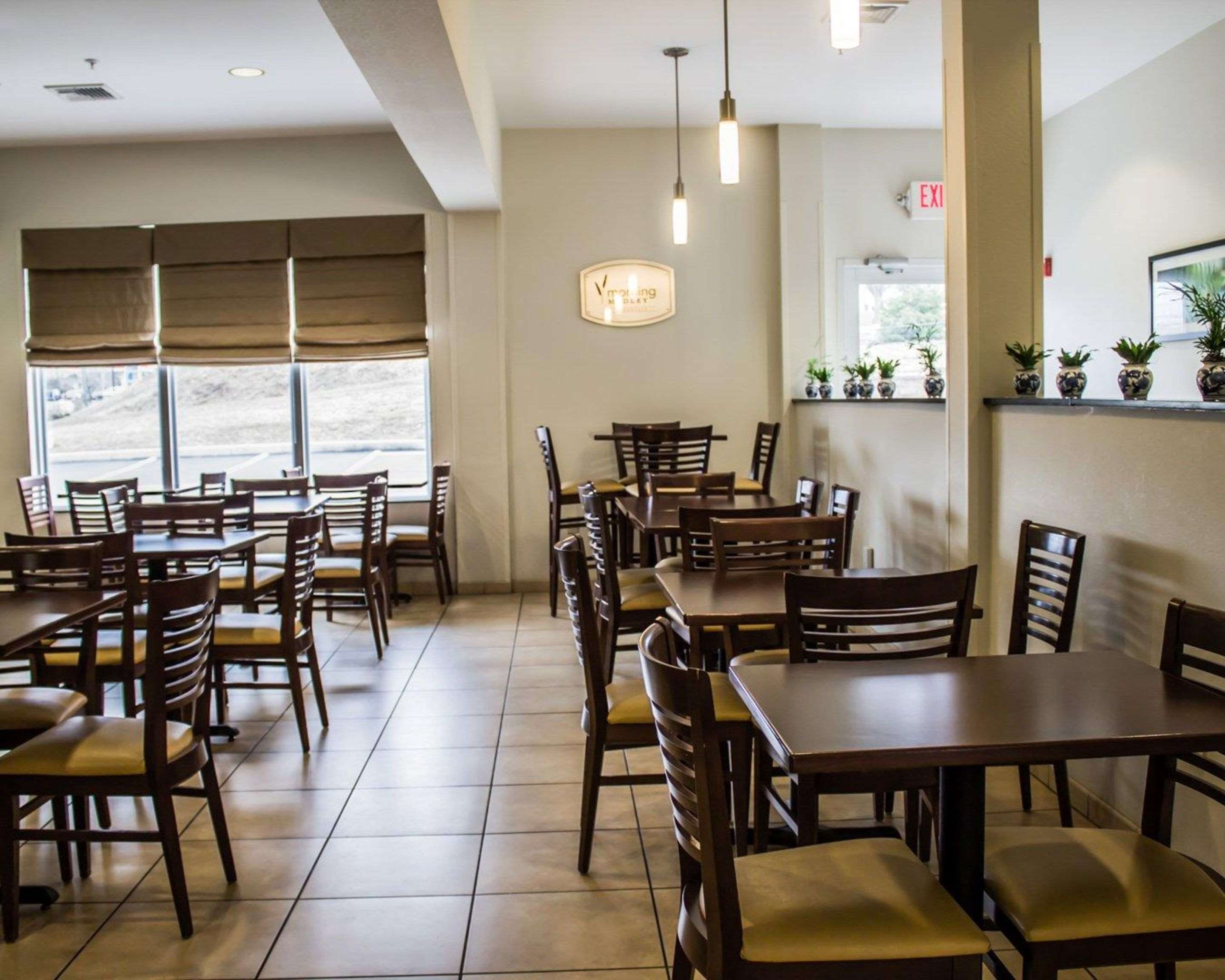 Enjoy breakfast in this seating area | Sleep Inn & Suites