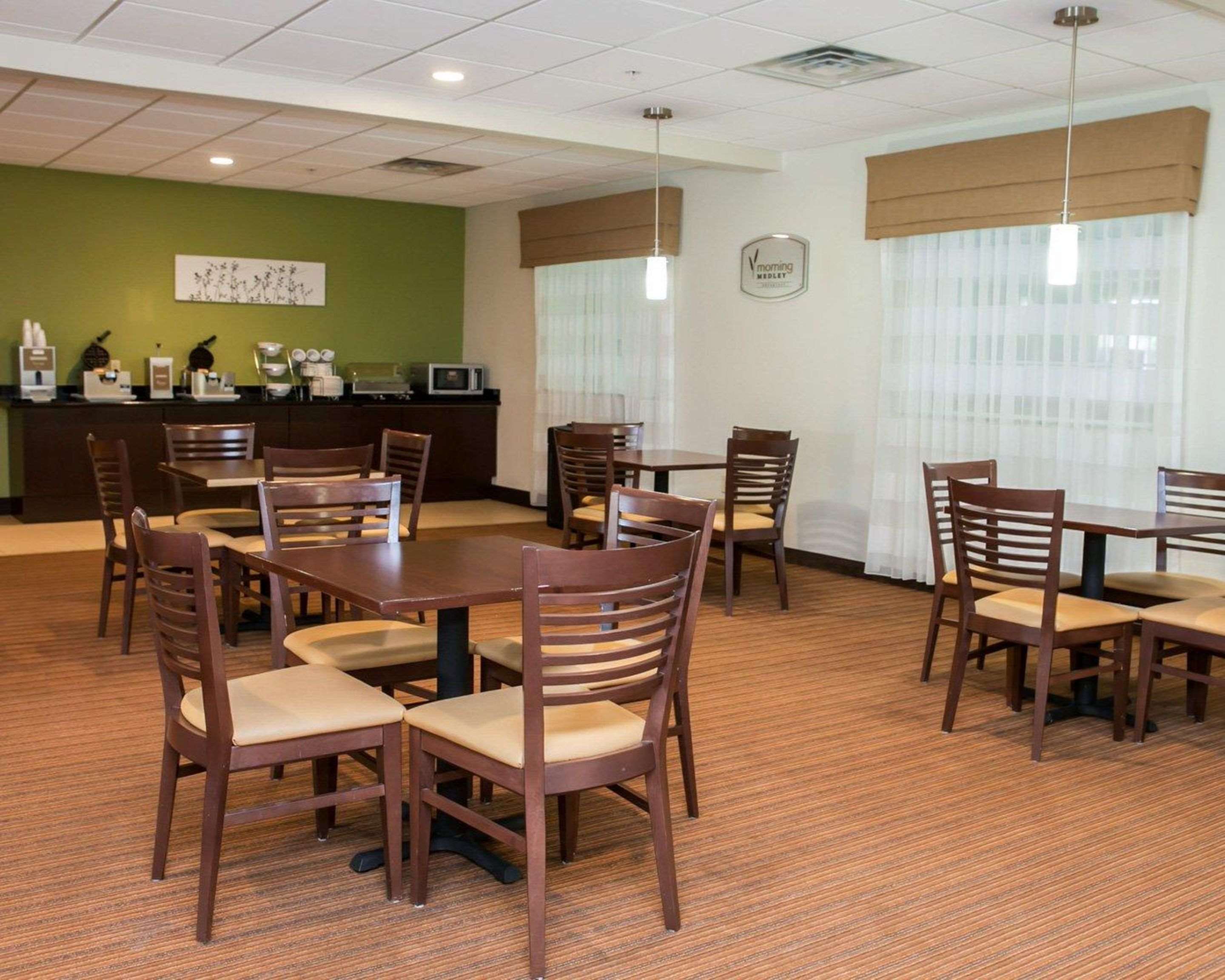 Enjoy breakfast in this seating area | Sleep Inn & Suites Harrisburg - Hershey North