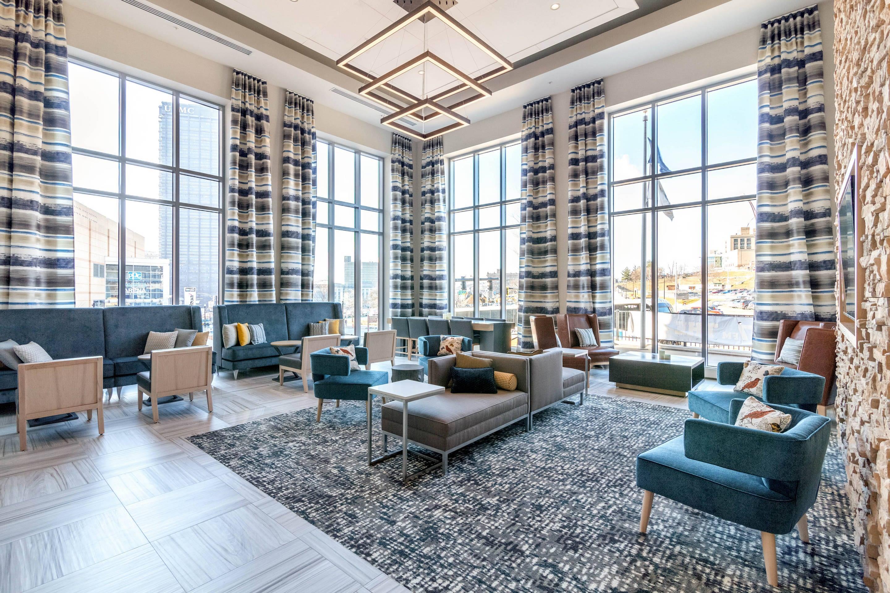 Spacious lobby with sitting area | Cambria Hotel Pittsburgh - Downtown