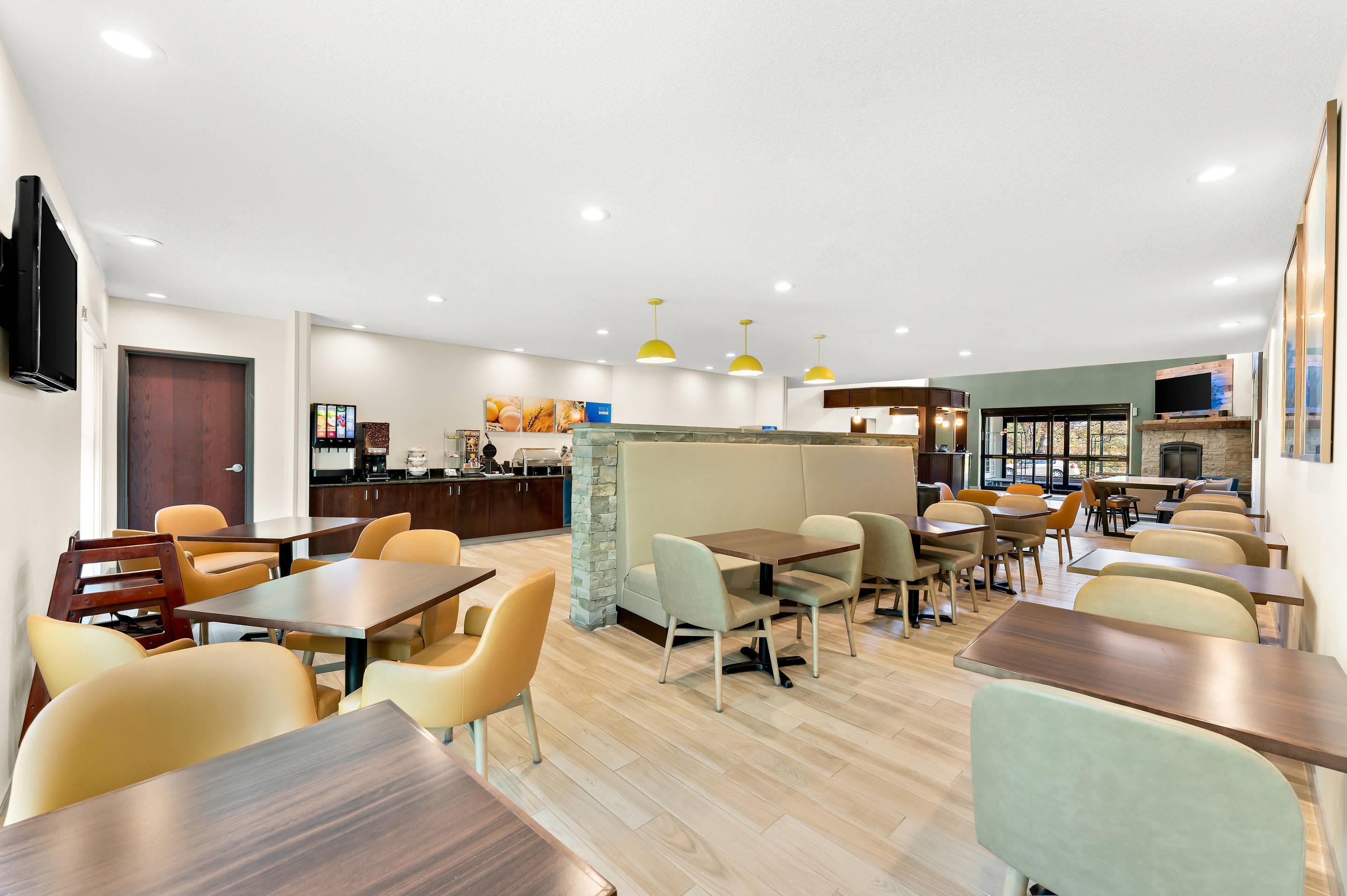 Enjoy breakfast in this seating area | Comfort Inn & Suites Tunkhannock