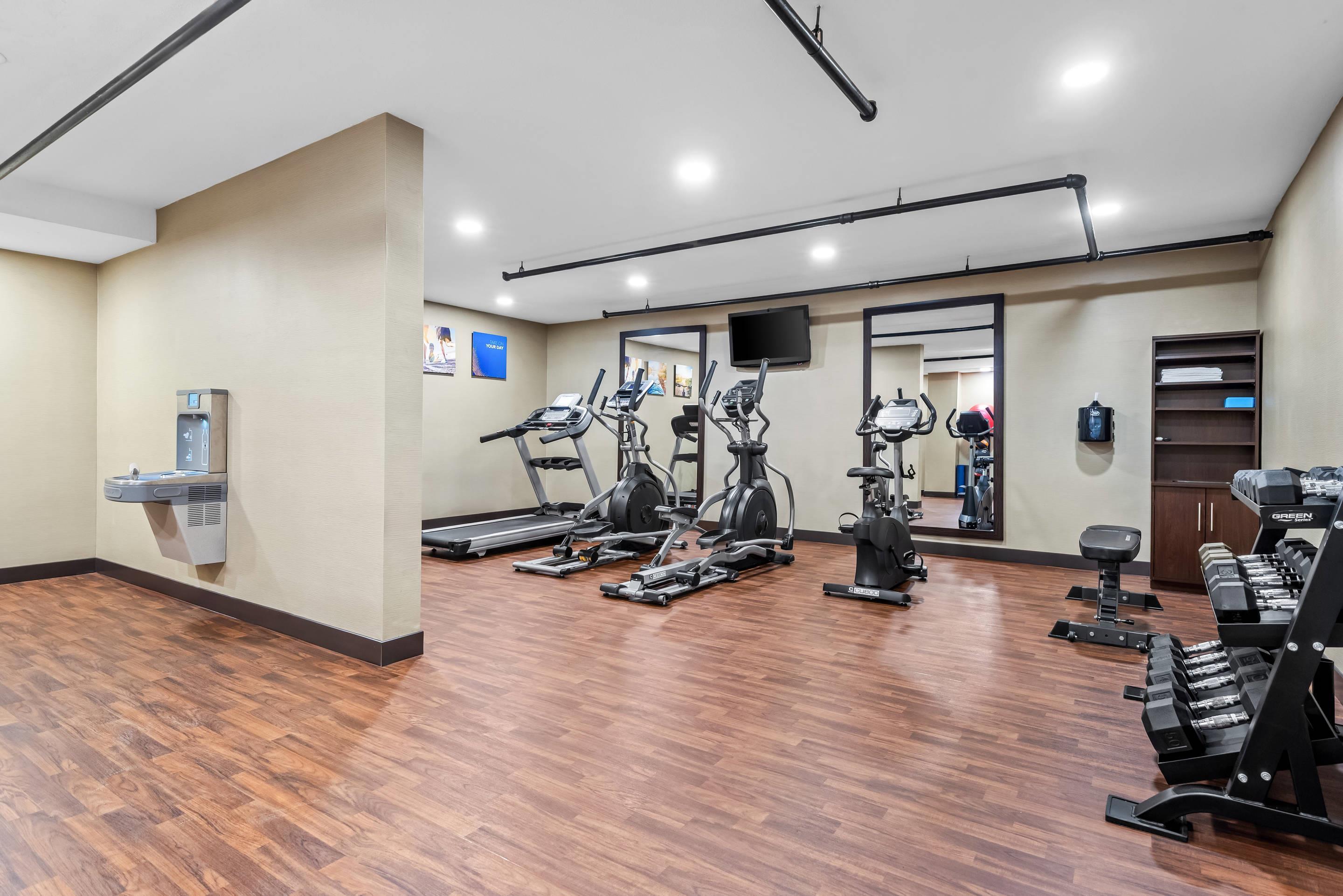 Exercise room with cardio equipment | Comfort Inn