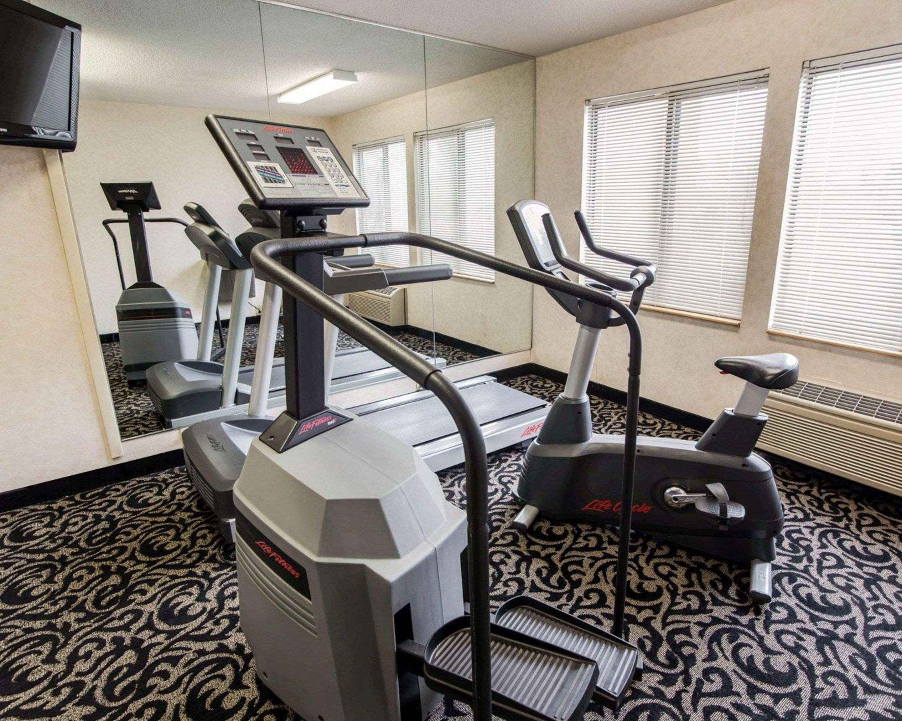Exercise room with cardio equipment | Sleep Inn Florence