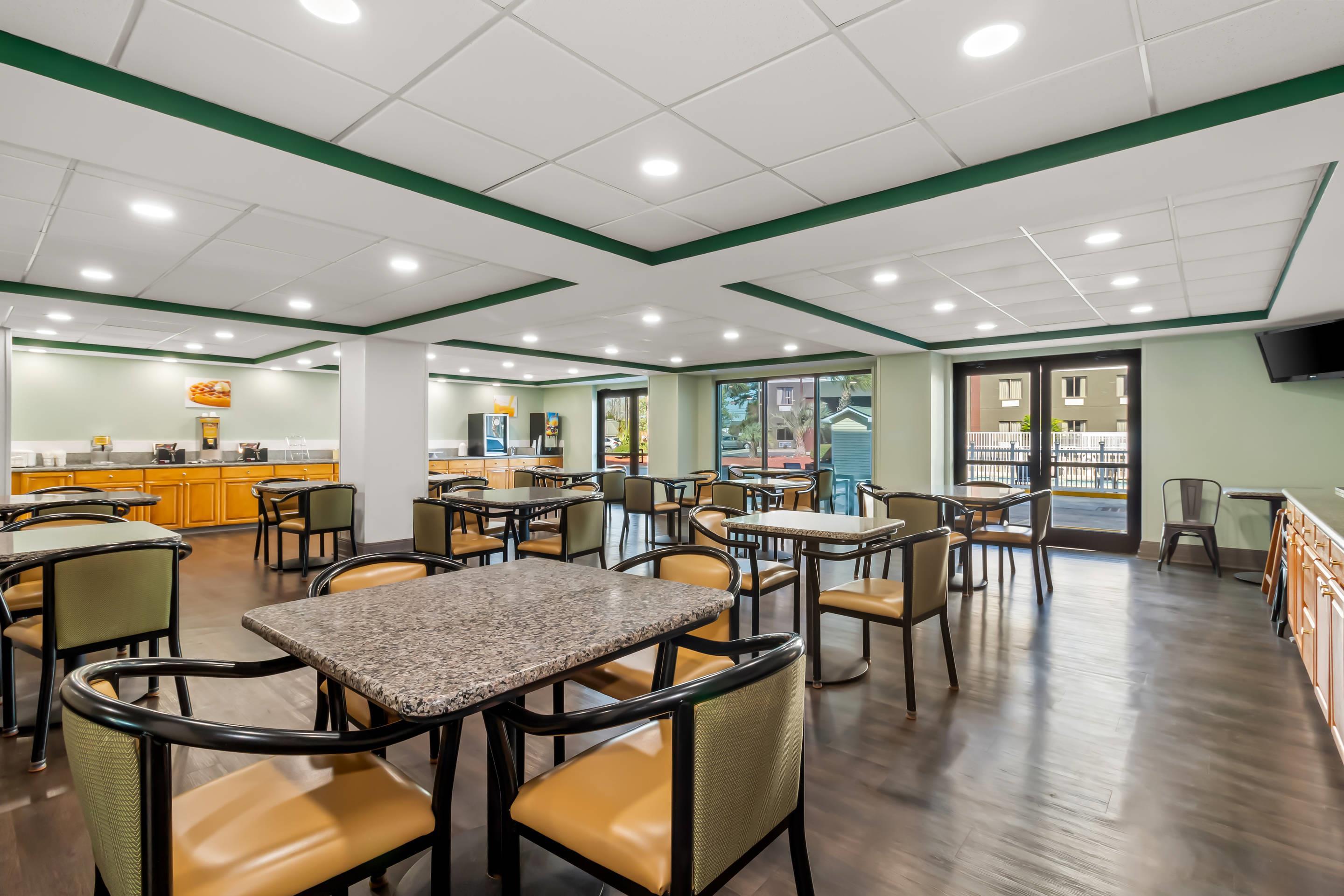 Enjoy breakfast in this seating area | Quality Inn & Suites North Myrtle Beach