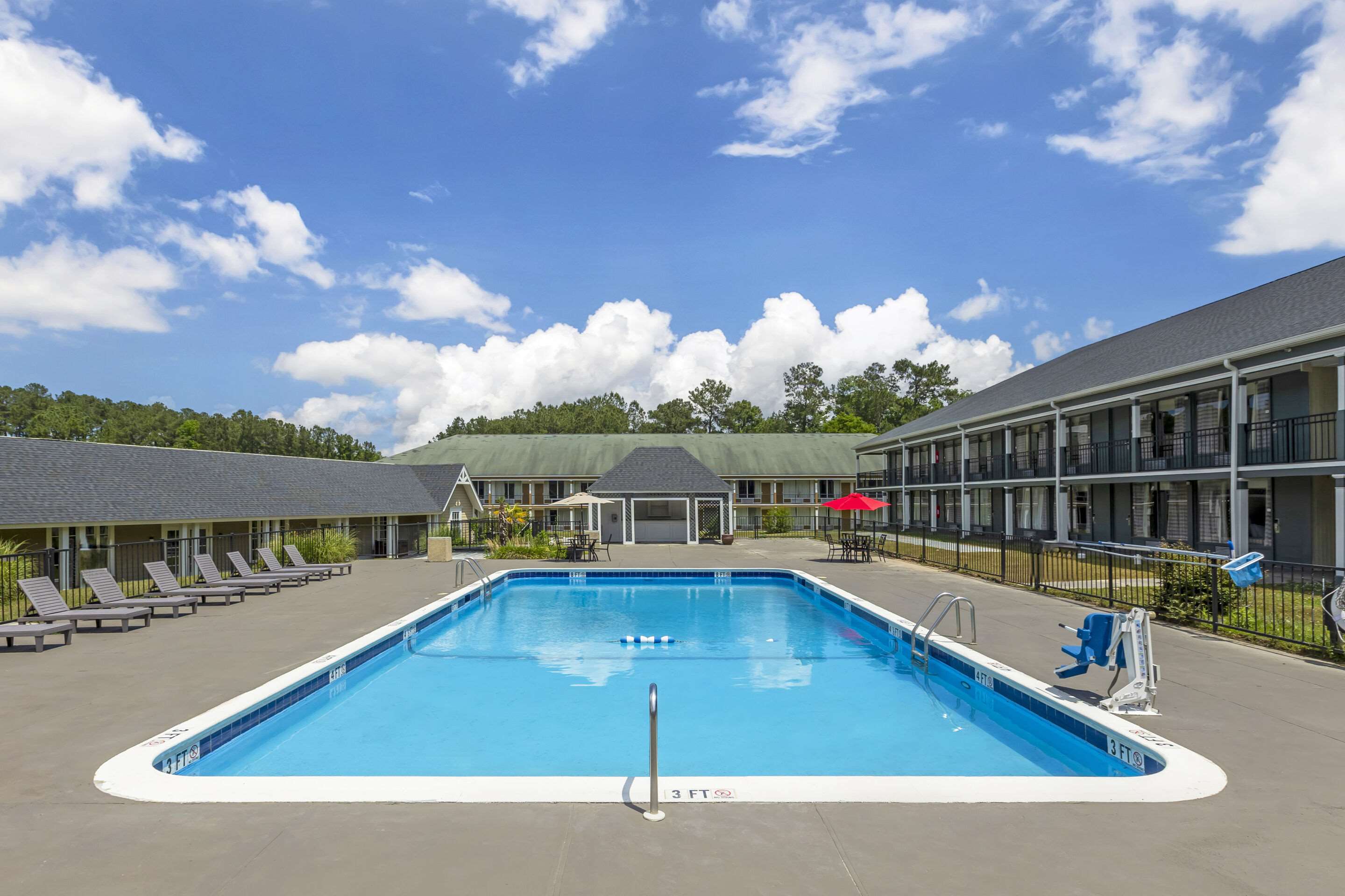 Outdoor pool | Quality Inn & Suites