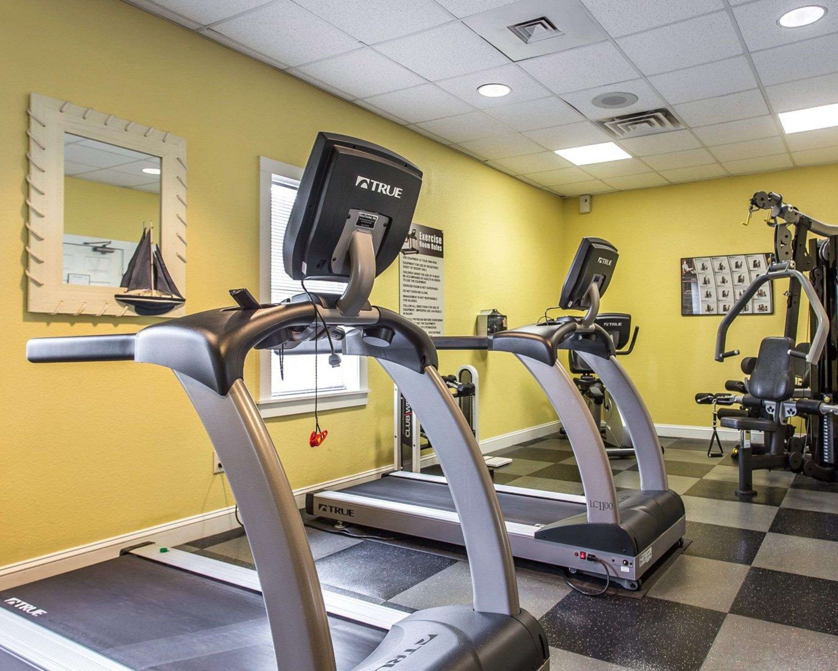 Fitness center with cardio equipment and weights | Bluegreen Vacations Harbour Lights, Ascend Resort Collection