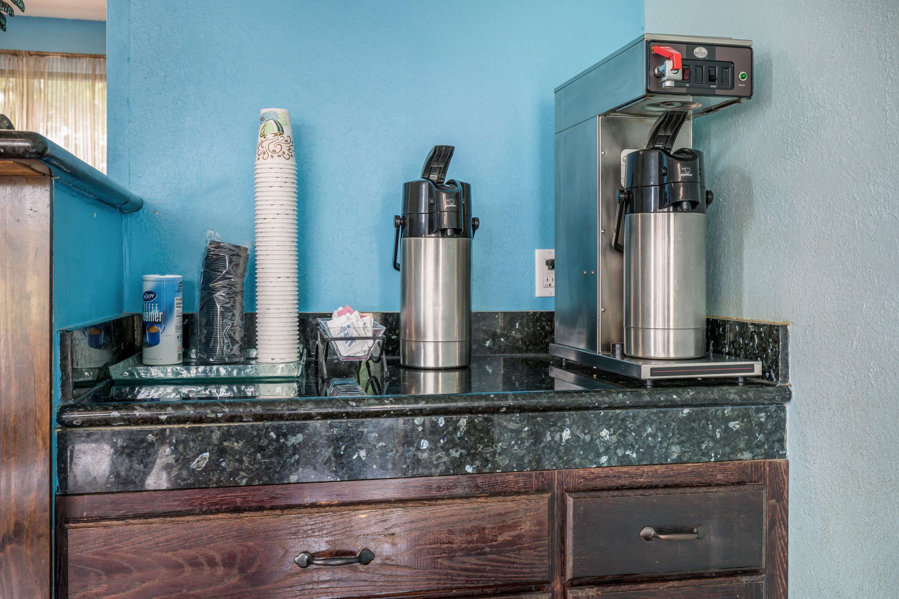 Enjoy coffee in the lobby | Rodeway Inn Anderson