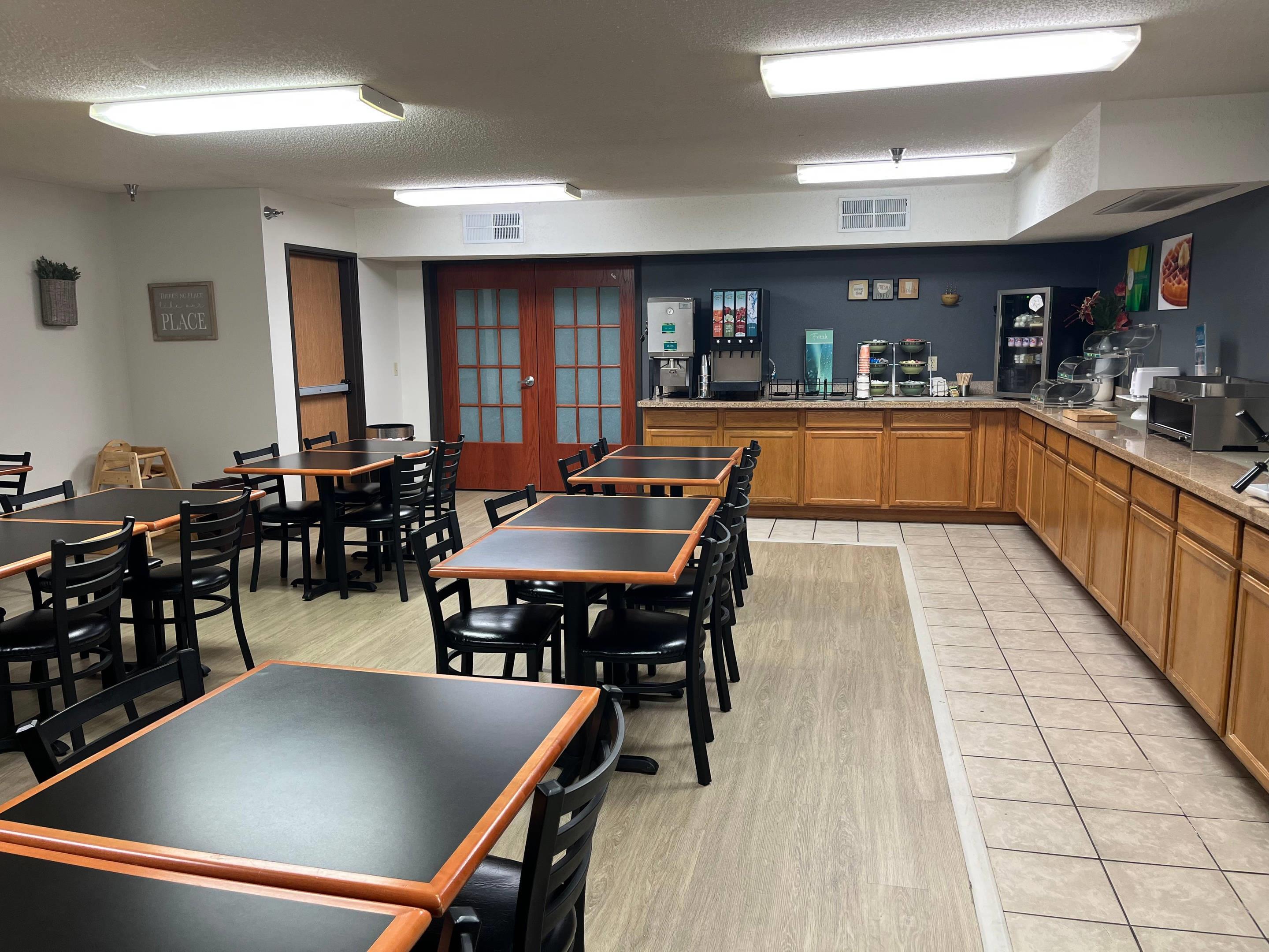 Enjoy breakfast in this seating area | Quality Inn & Suites Watertown