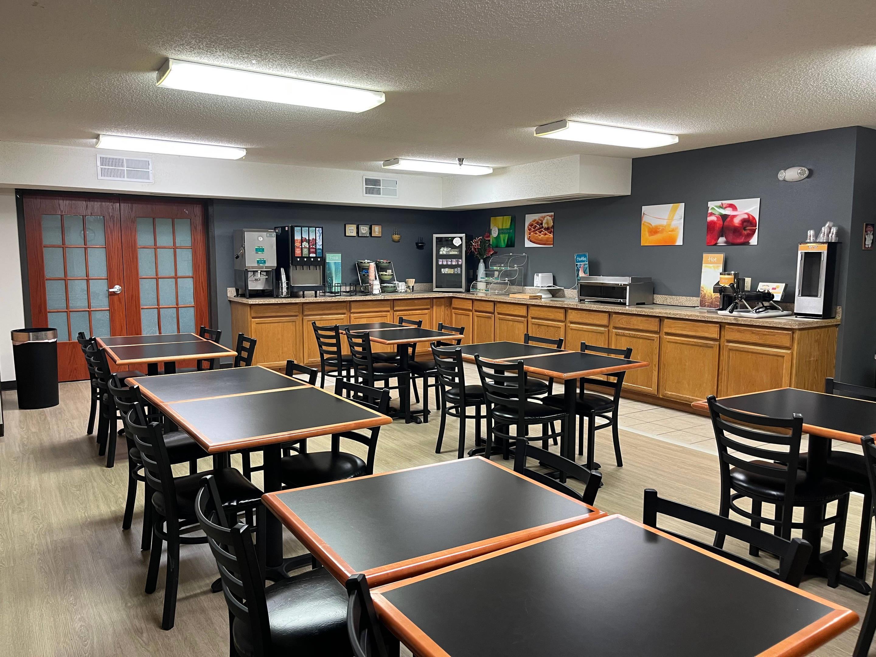 Enjoy breakfast in this seating area | Quality Inn & Suites Watertown