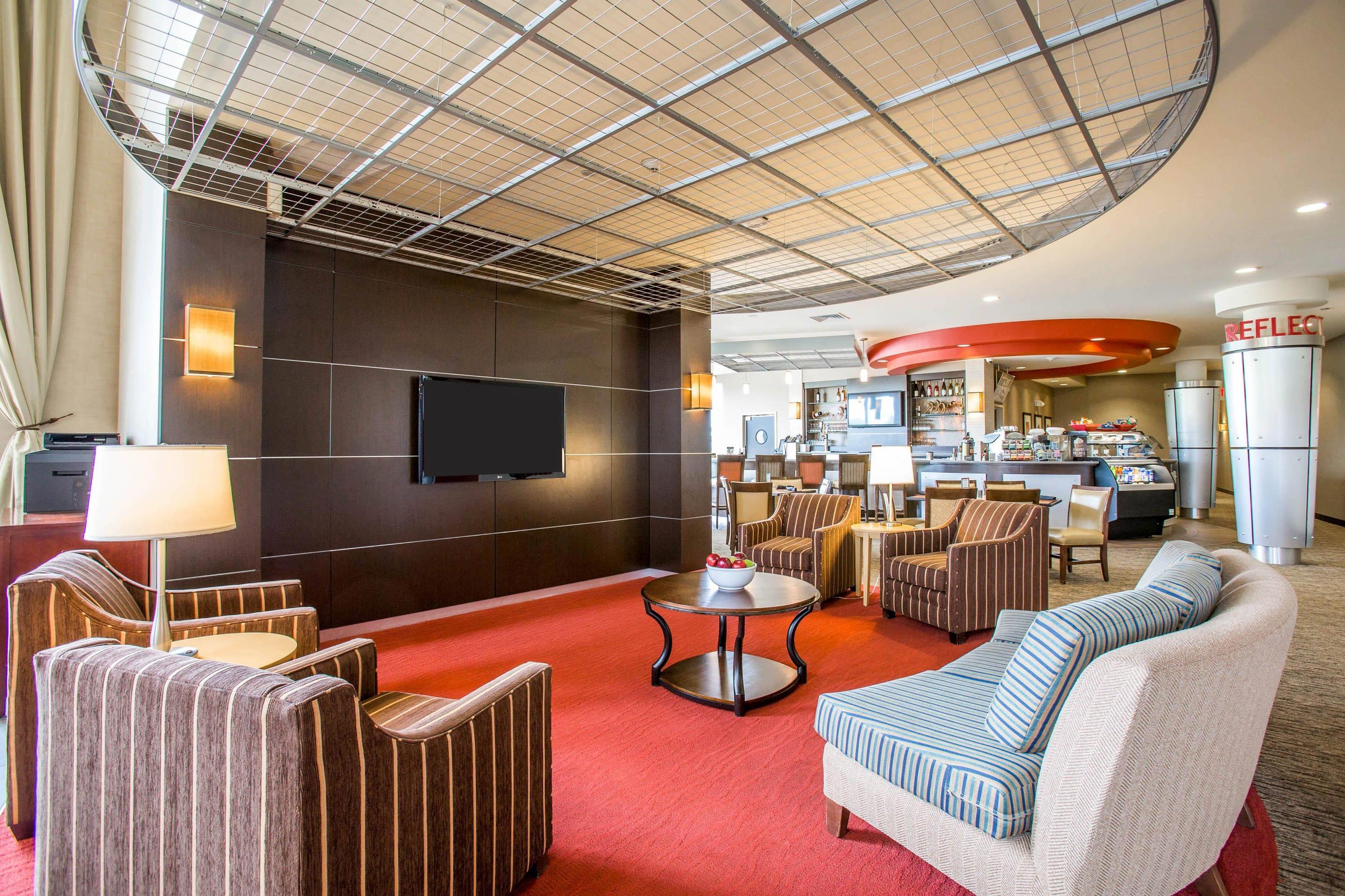 Catch up on the day in front of the large-screen media wall | Cambria Hotel Rapid City near Mount Rushmore