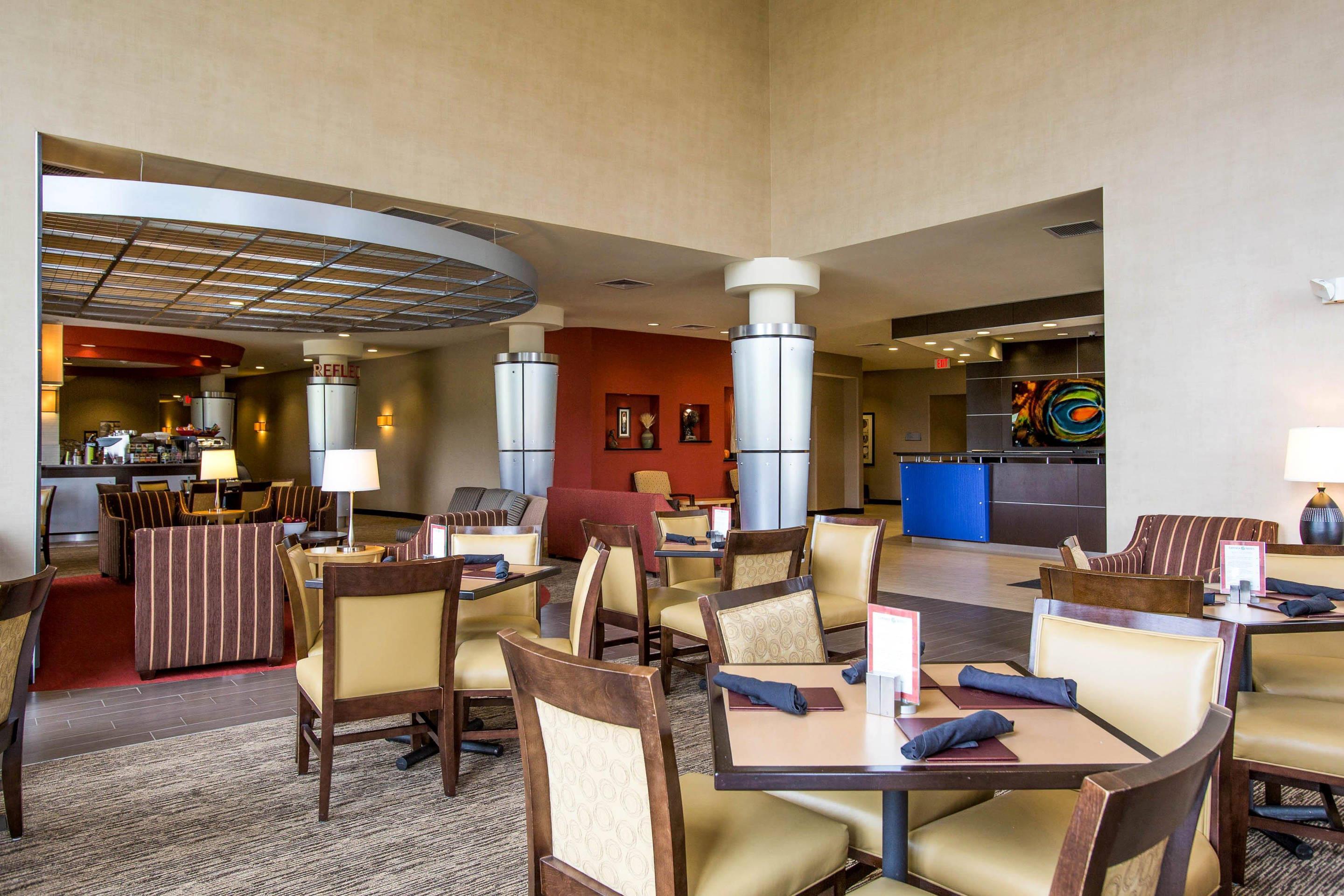 Enjoy breakfast in this seating area | Cambria Hotel Rapid City near Mount Rushmore