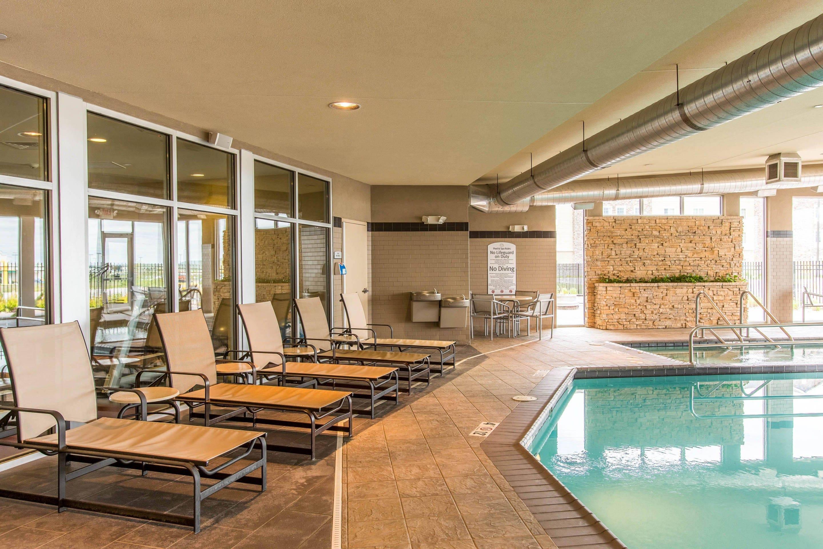 Relax by the pool | Cambria Hotel Rapid City near Mount Rushmore