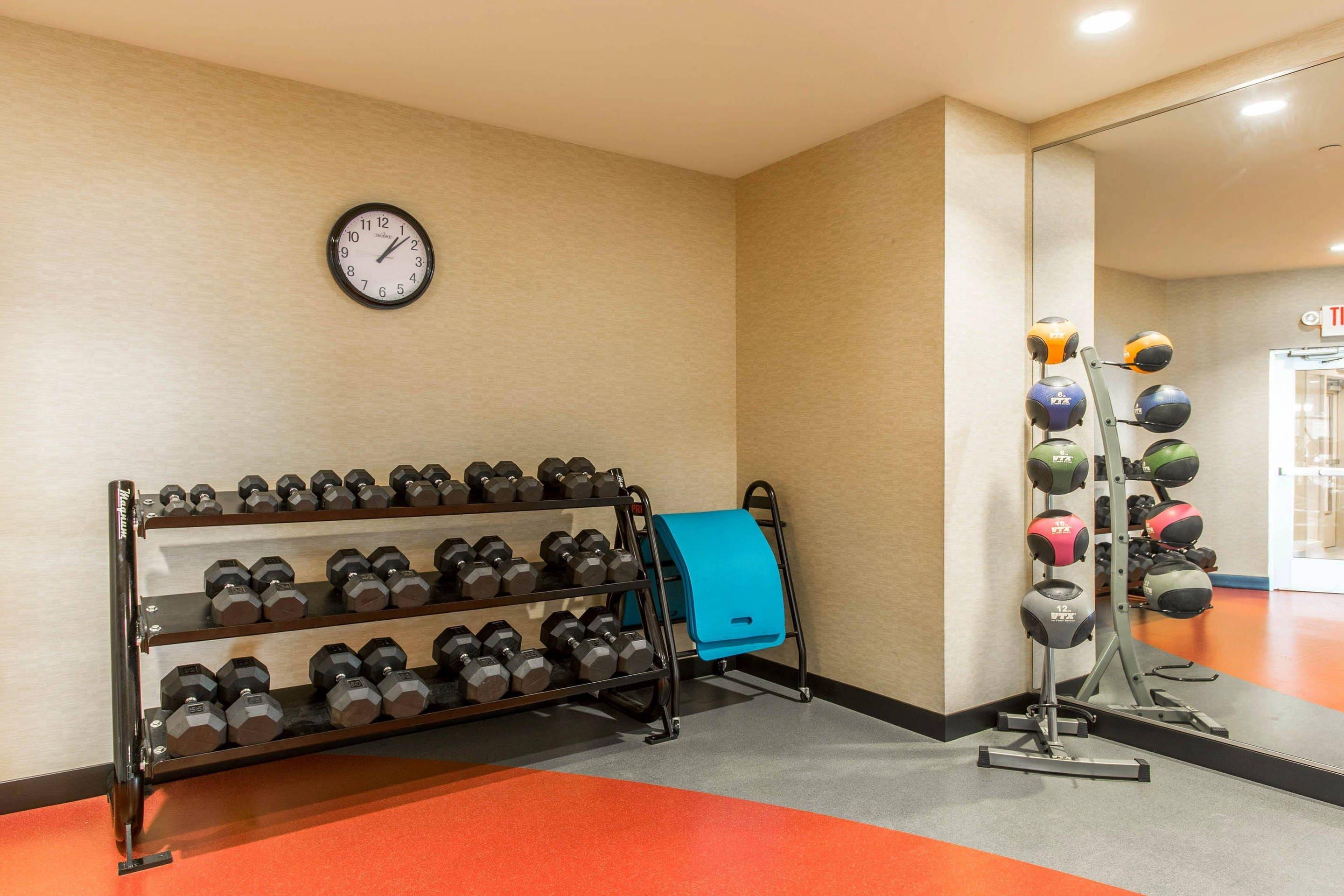Exercise room with free weights | Cambria Hotel Rapid City near Mount Rushmore