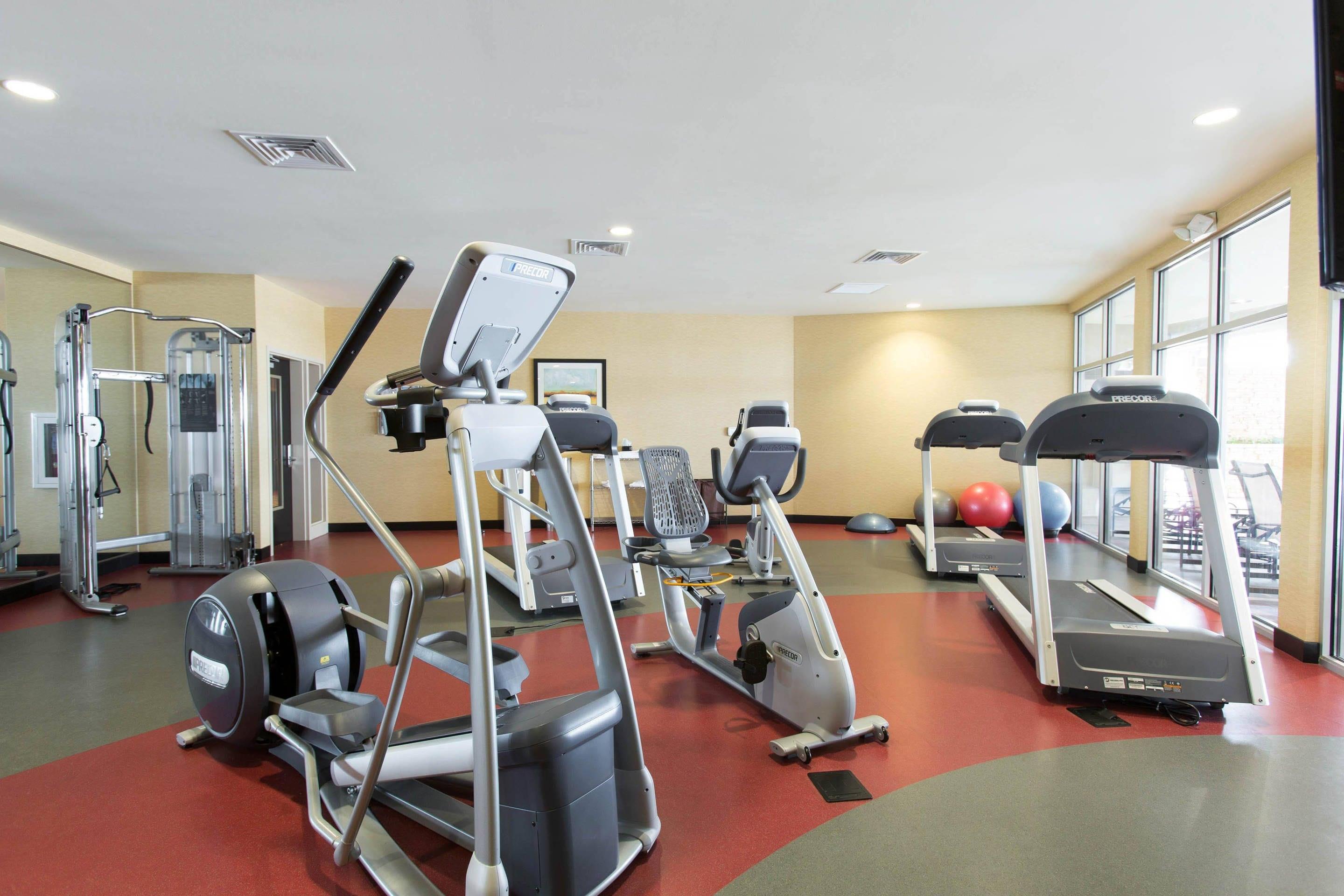 Exercise room with cardio equipment and weights | Cambria Hotel Rapid City near Mount Rushmore