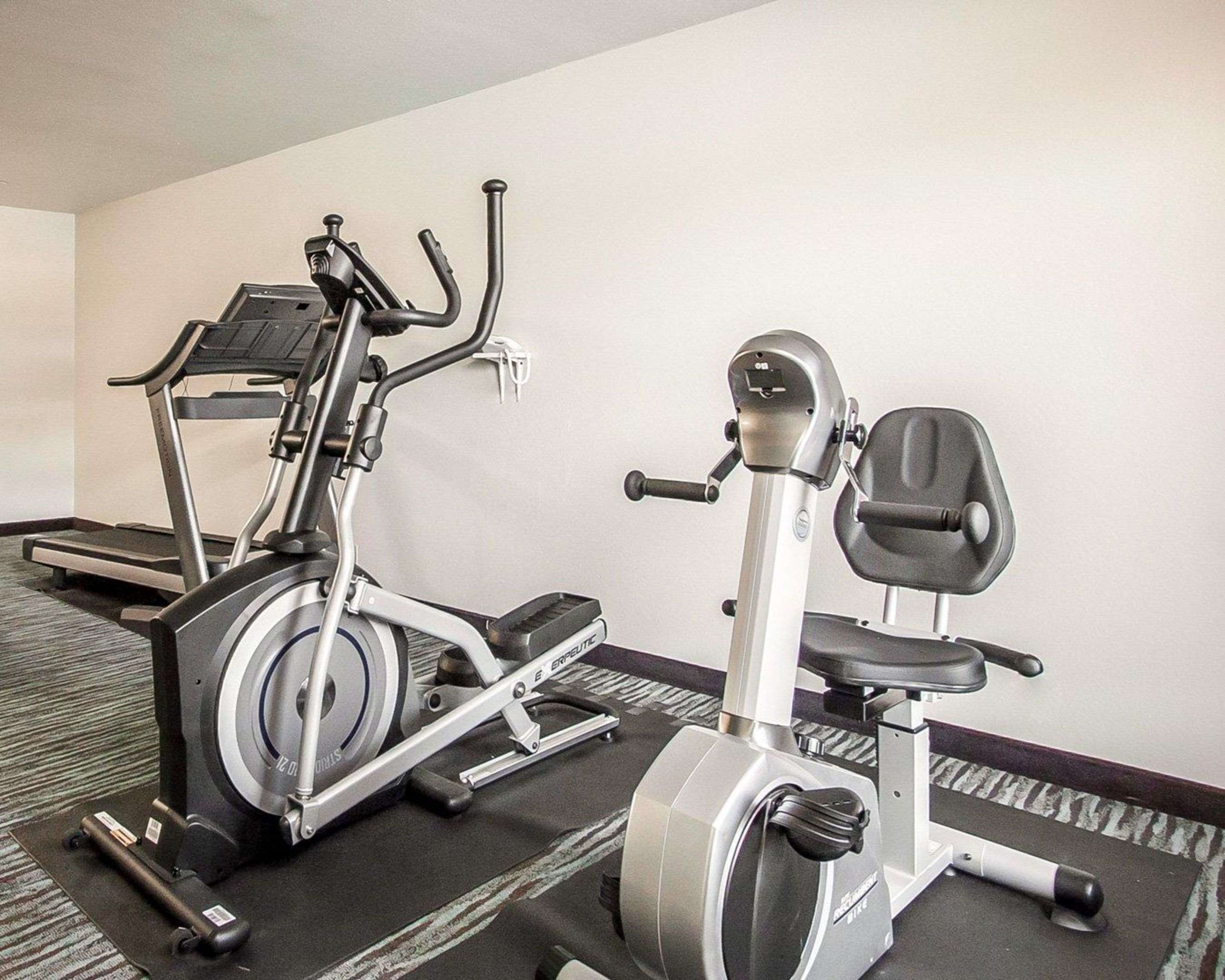 Fitness center with cardio equipment and weights | Econo Lodge Inn and Suites - Jackson