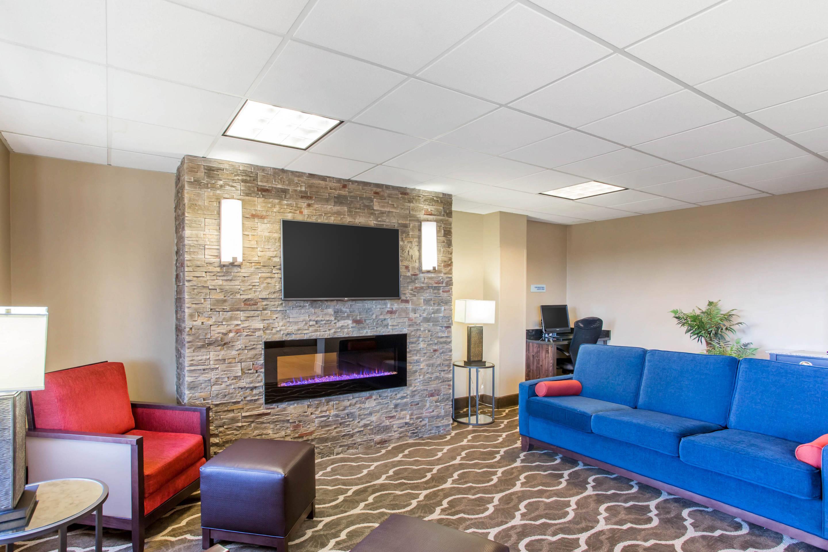 Relax by the fireplace in the lobby | Comfort Inn Franklin Highway 96