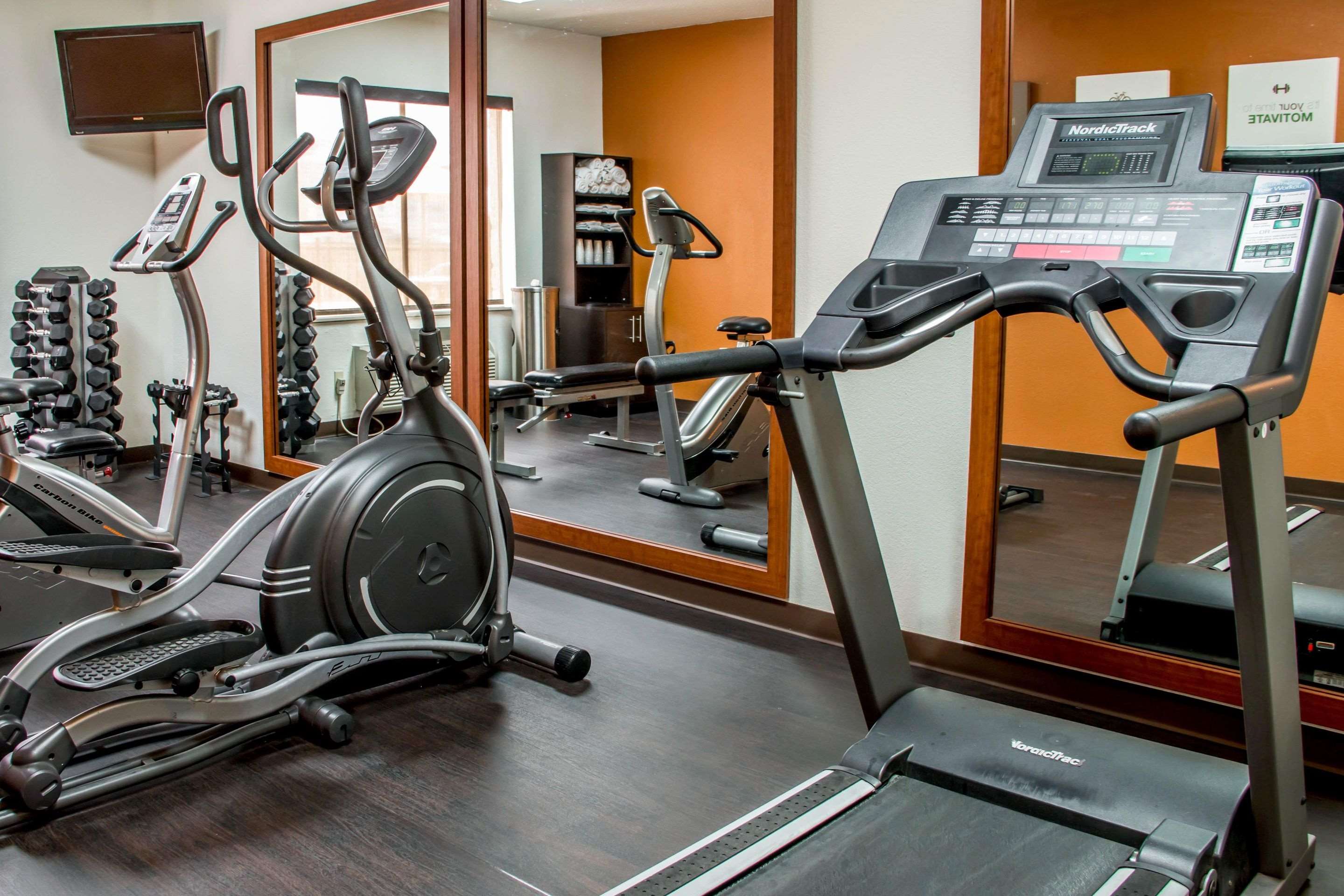 Fitness center with cardio equipment and weights